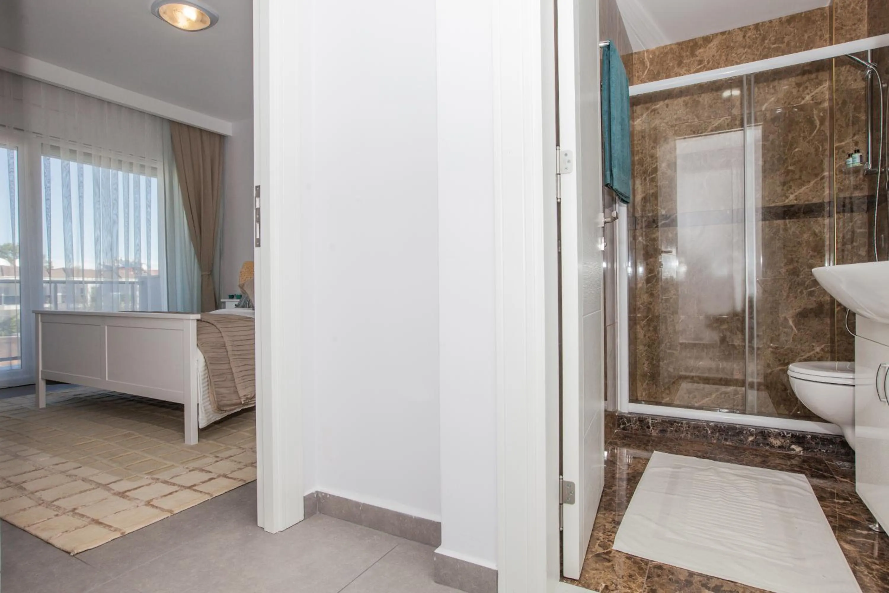 Shower in Truemar Hotels & Suites