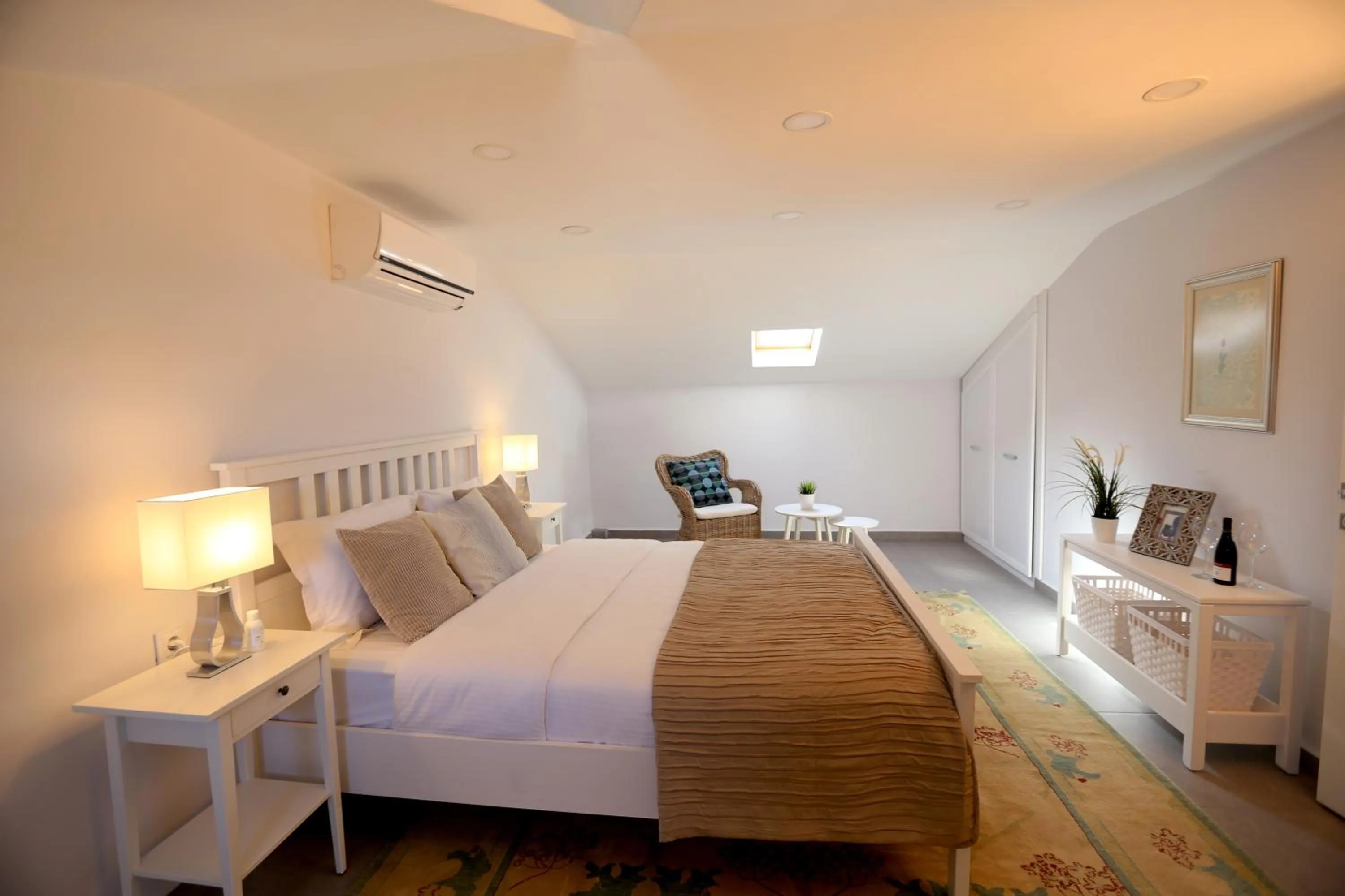 Bed in Truemar Hotels & Suites