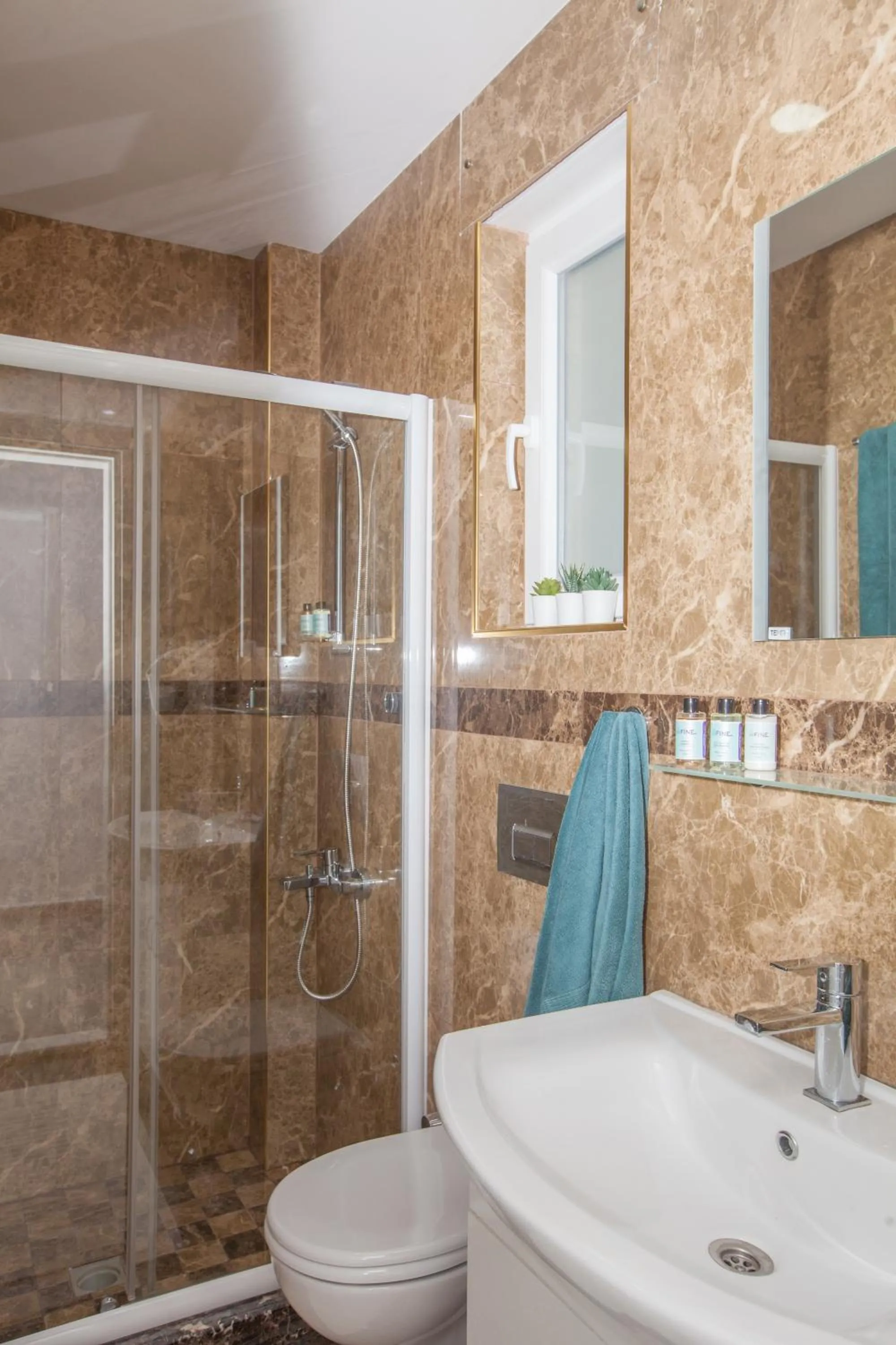 Shower in Truemar Hotels & Suites