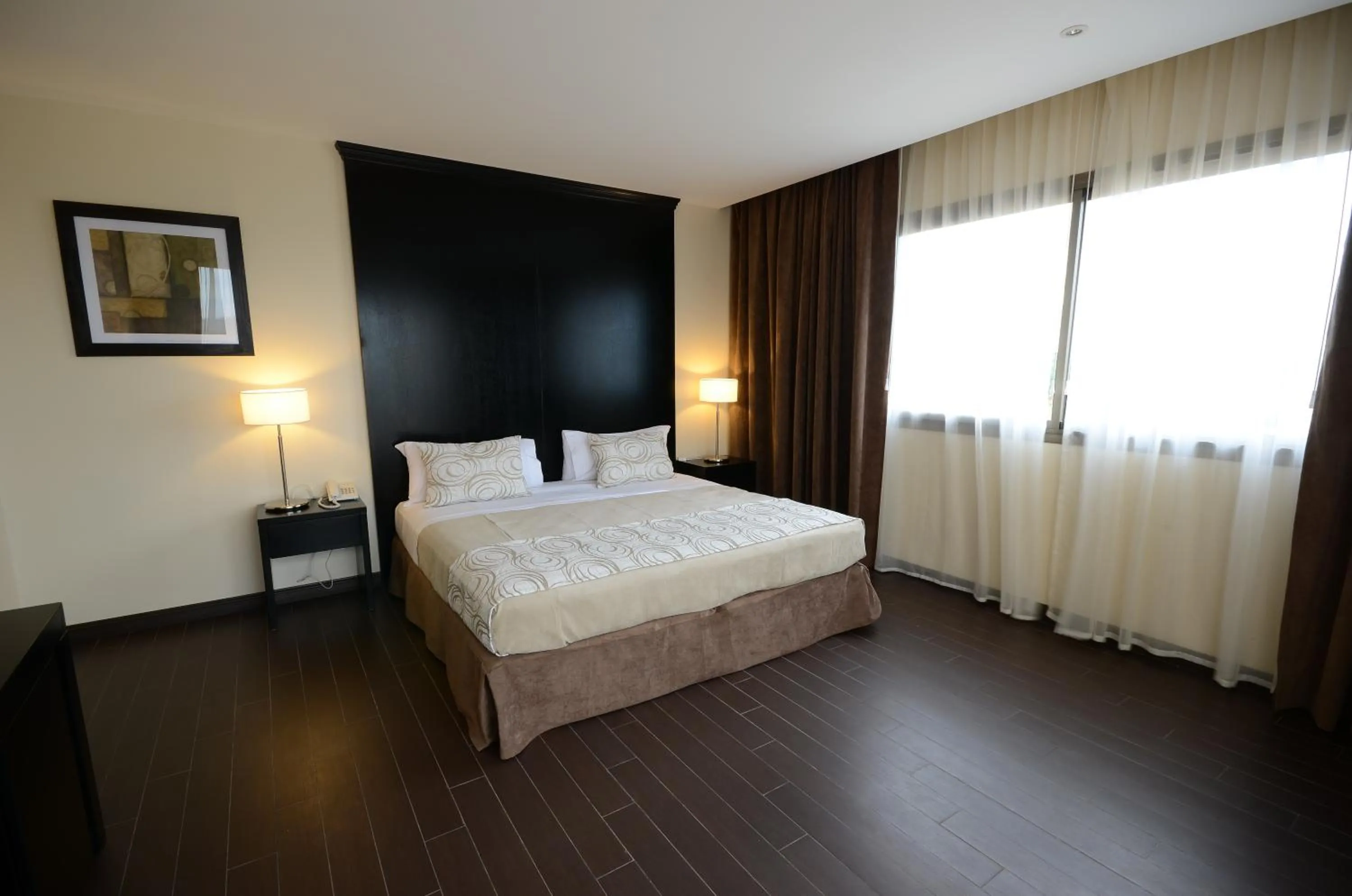 Bed in Grand Crucero Hotel