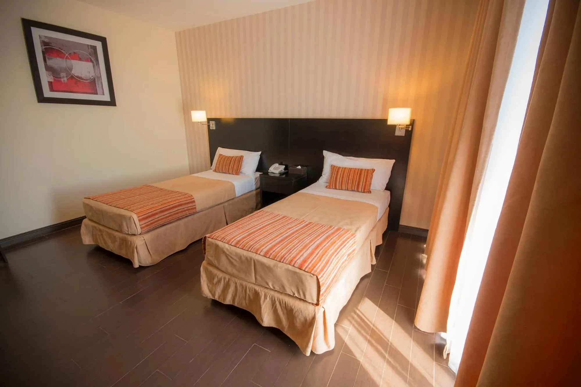 Bed in Grand Crucero Hotel