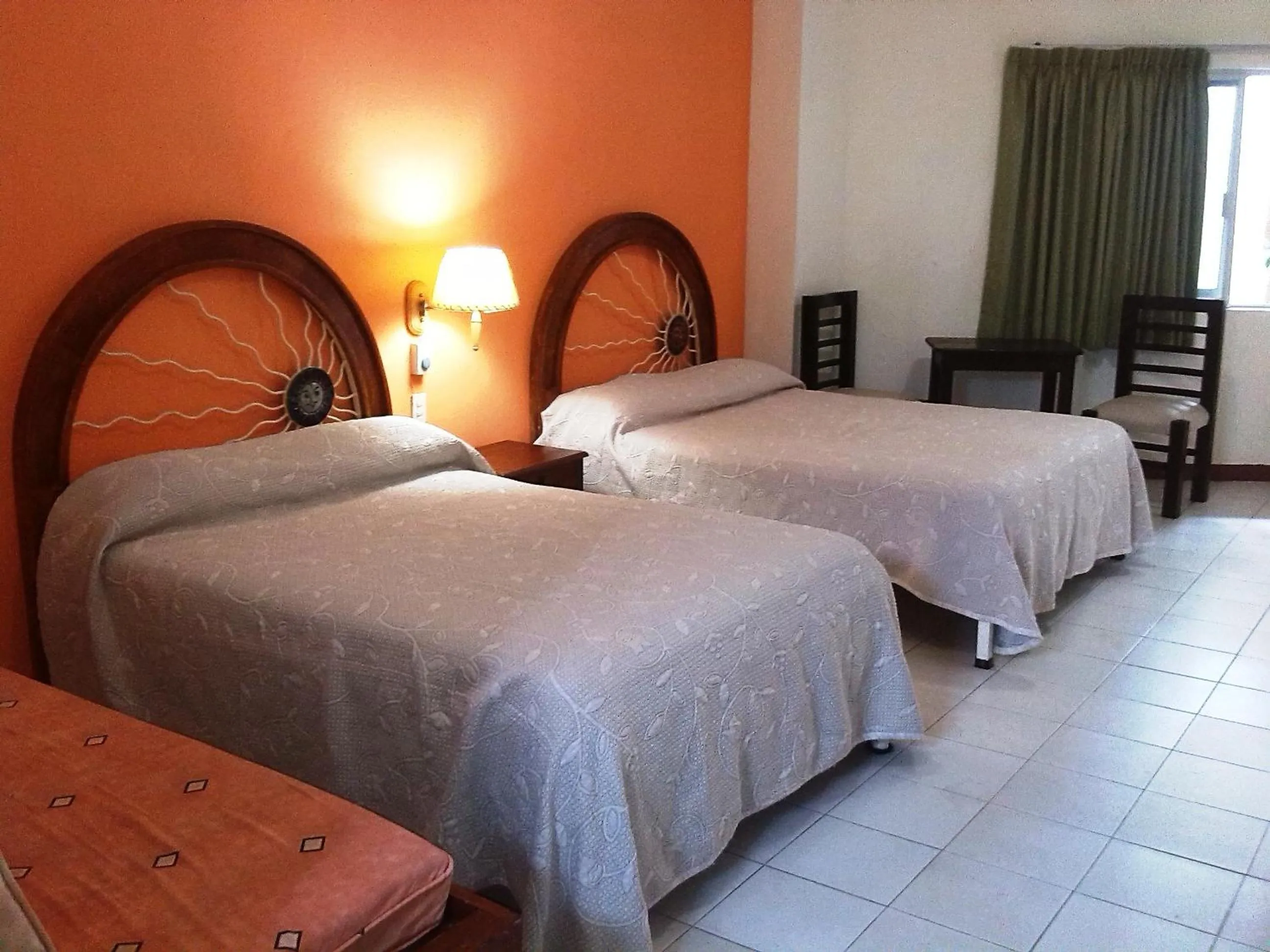 Bedroom, Bed in Hotel y Suites Corita