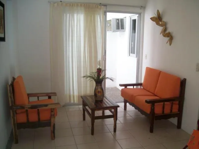 Living room in Hotel y Suites Corita