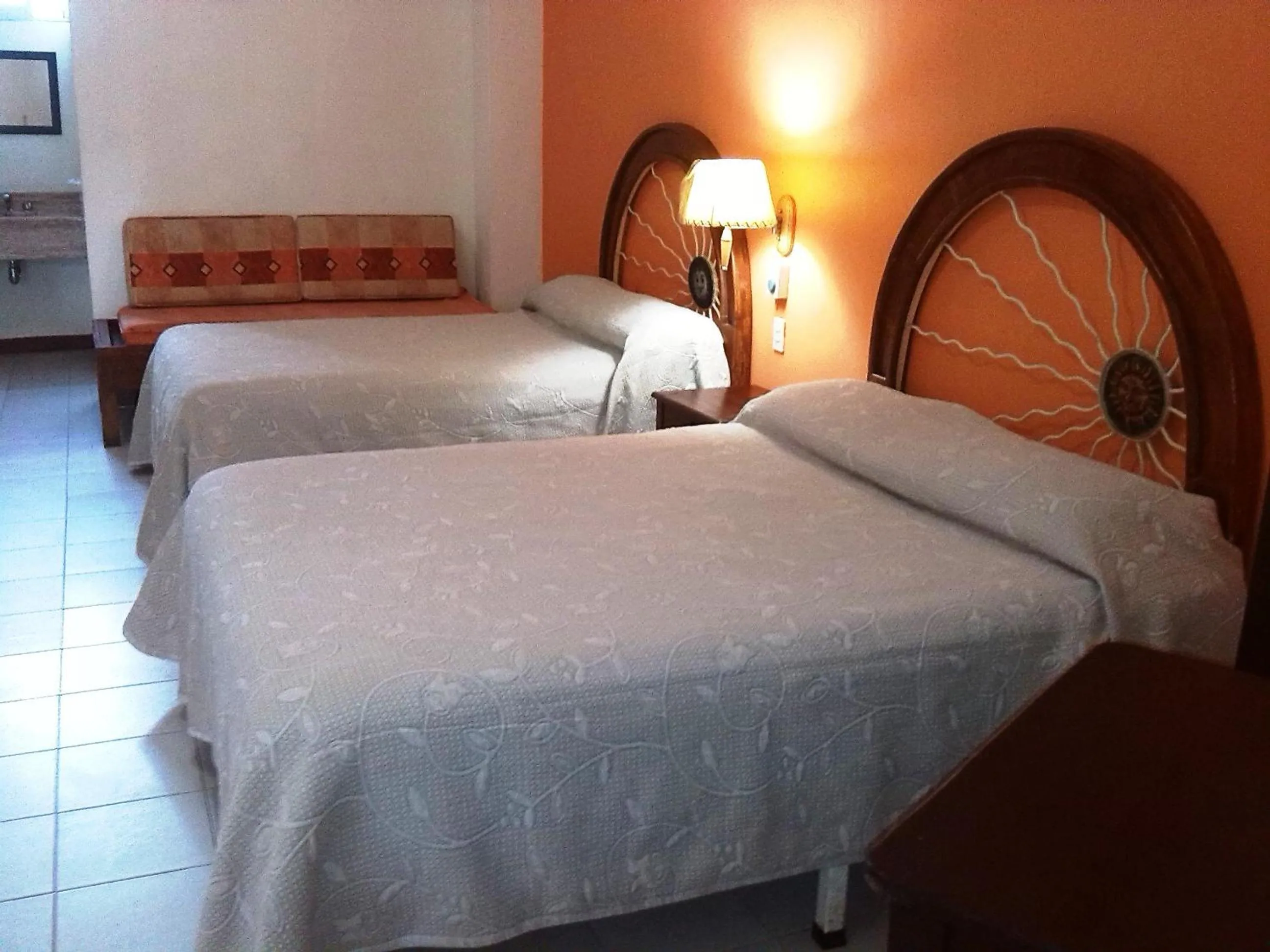 Photo of the whole room, Bed in Hotel y Suites Corita