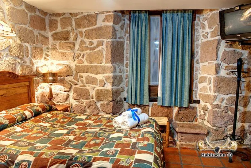 Bedroom in Hotel Casa del Anticuario