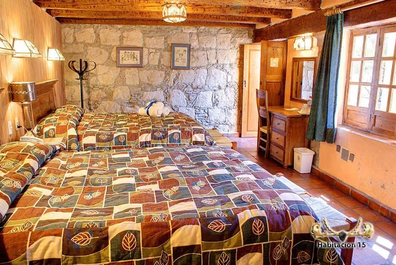 Bedroom in Hotel Casa del Anticuario