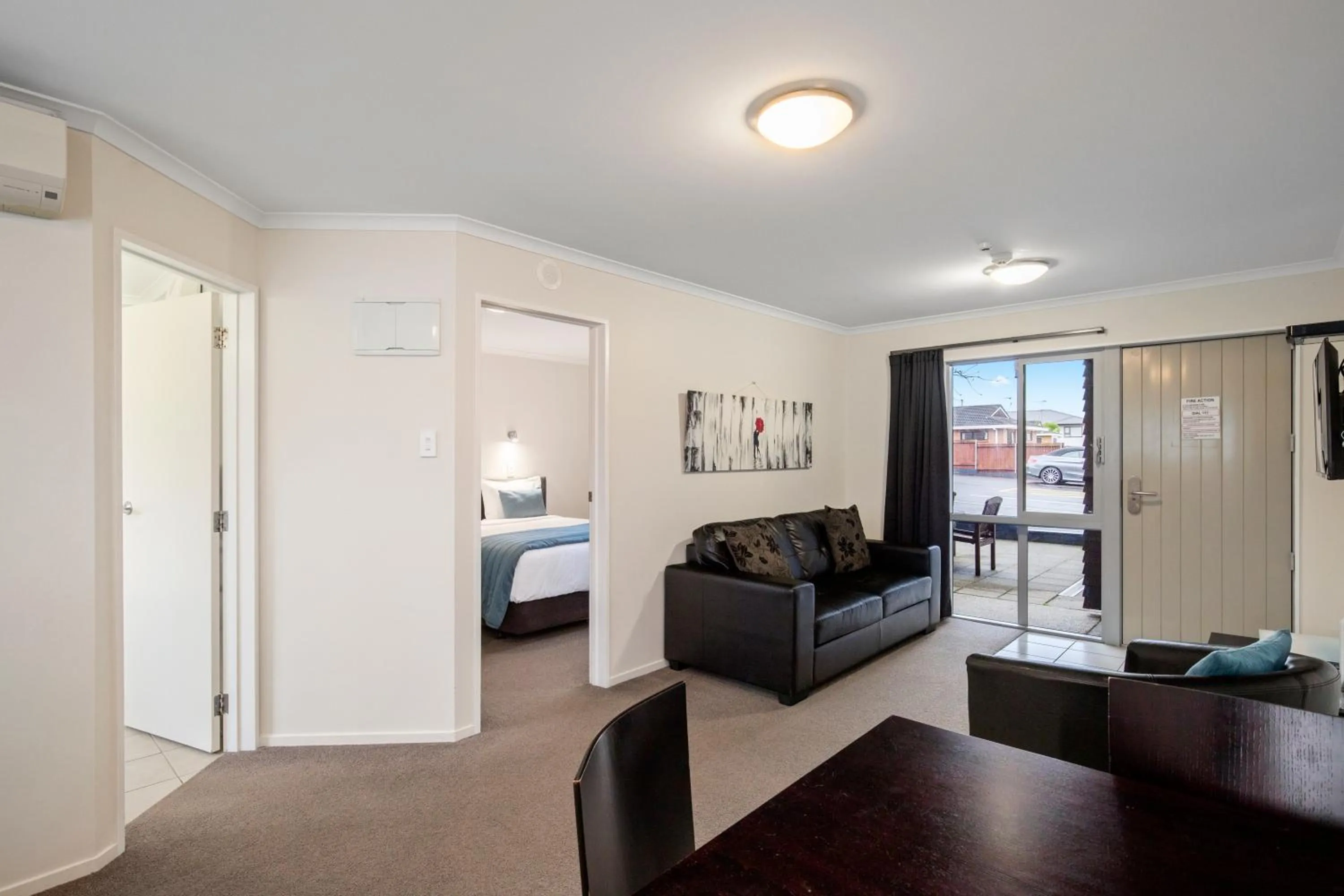 Bed in ASURE Aveda Motor Lodge