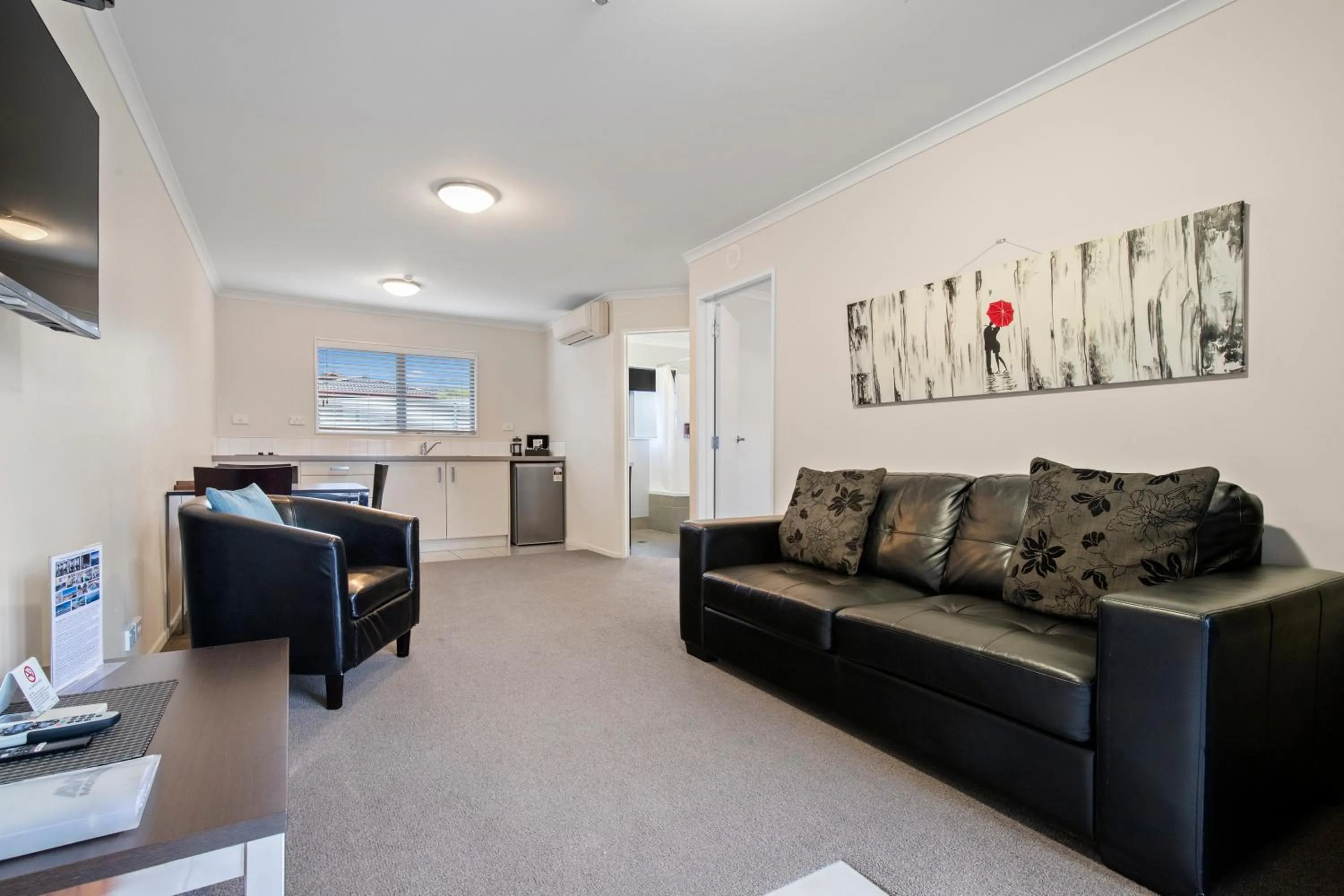 TV and multimedia, Bed in ASURE Aveda Motor Lodge