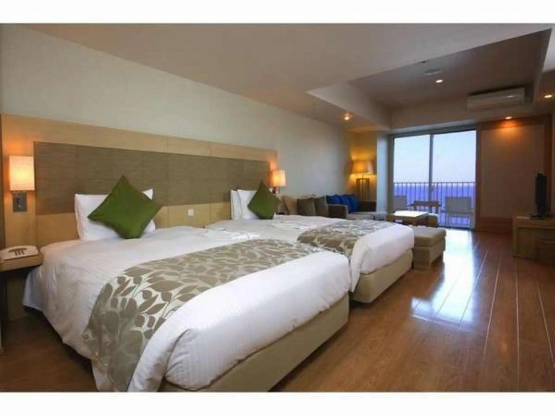 Bed in Moon Ocean Ginowan Hotel & Residence