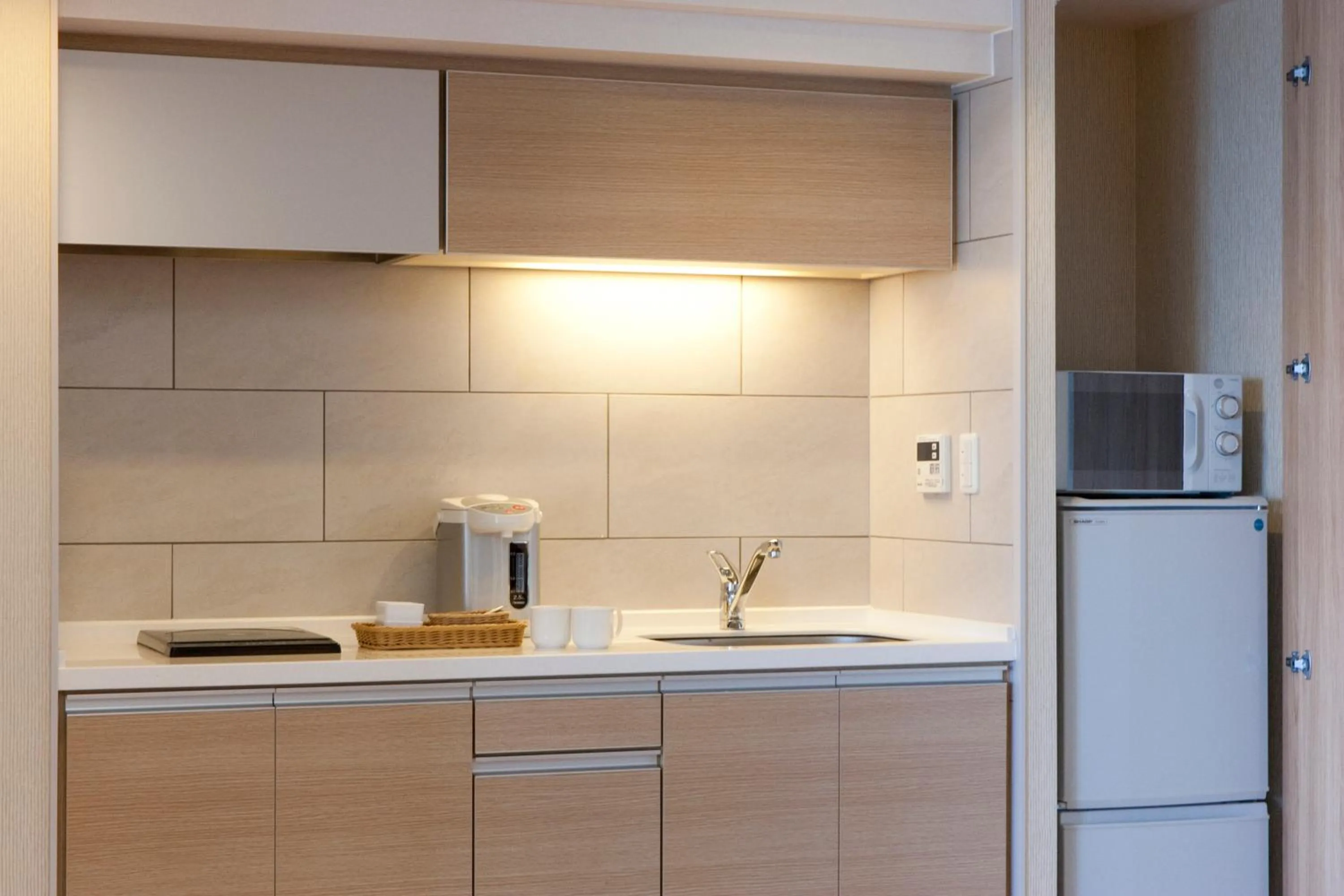 Kitchen or kitchenette in Moon Ocean Ginowan Hotel & Residence