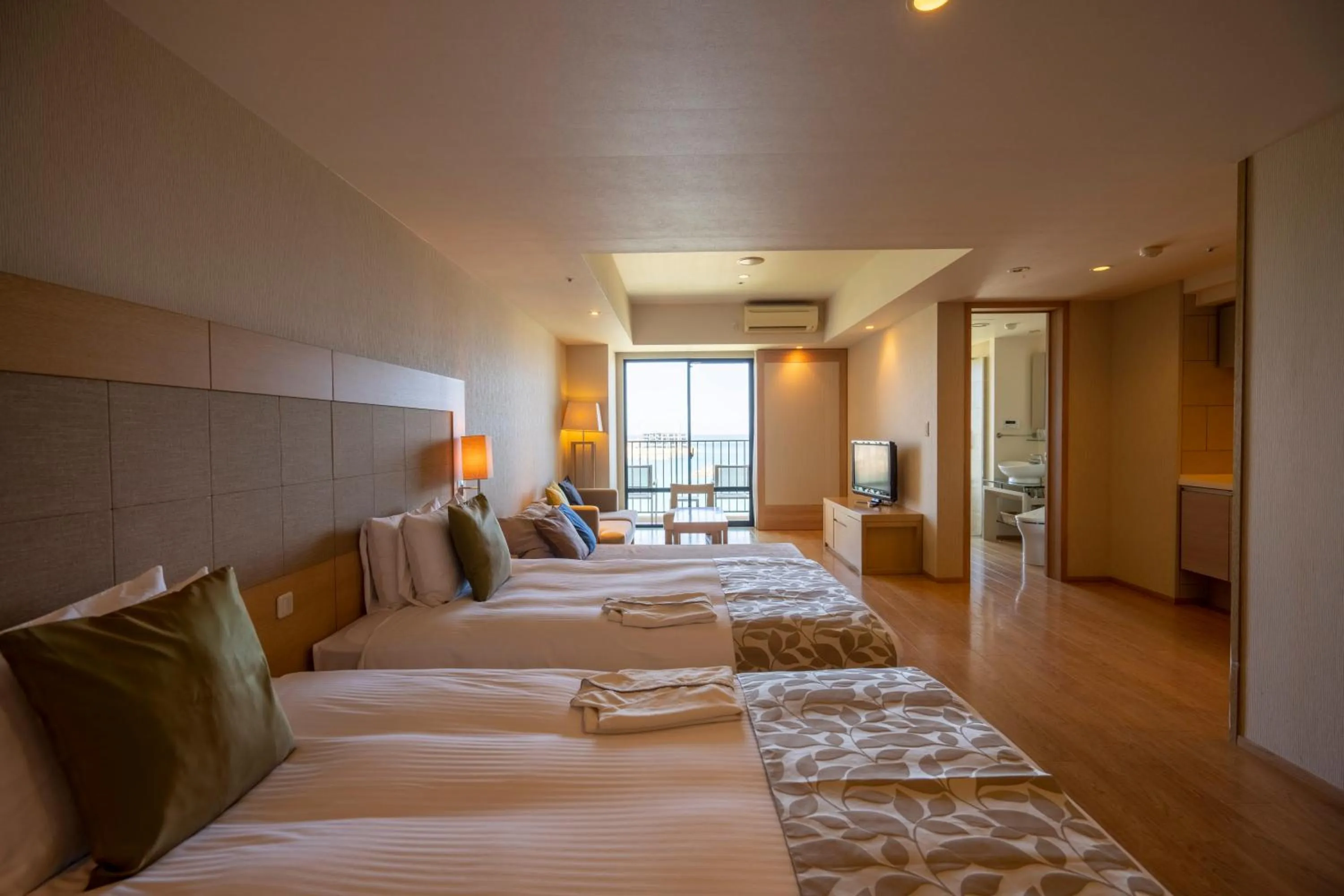 Bed in Moon Ocean Ginowan Hotel & Residence
