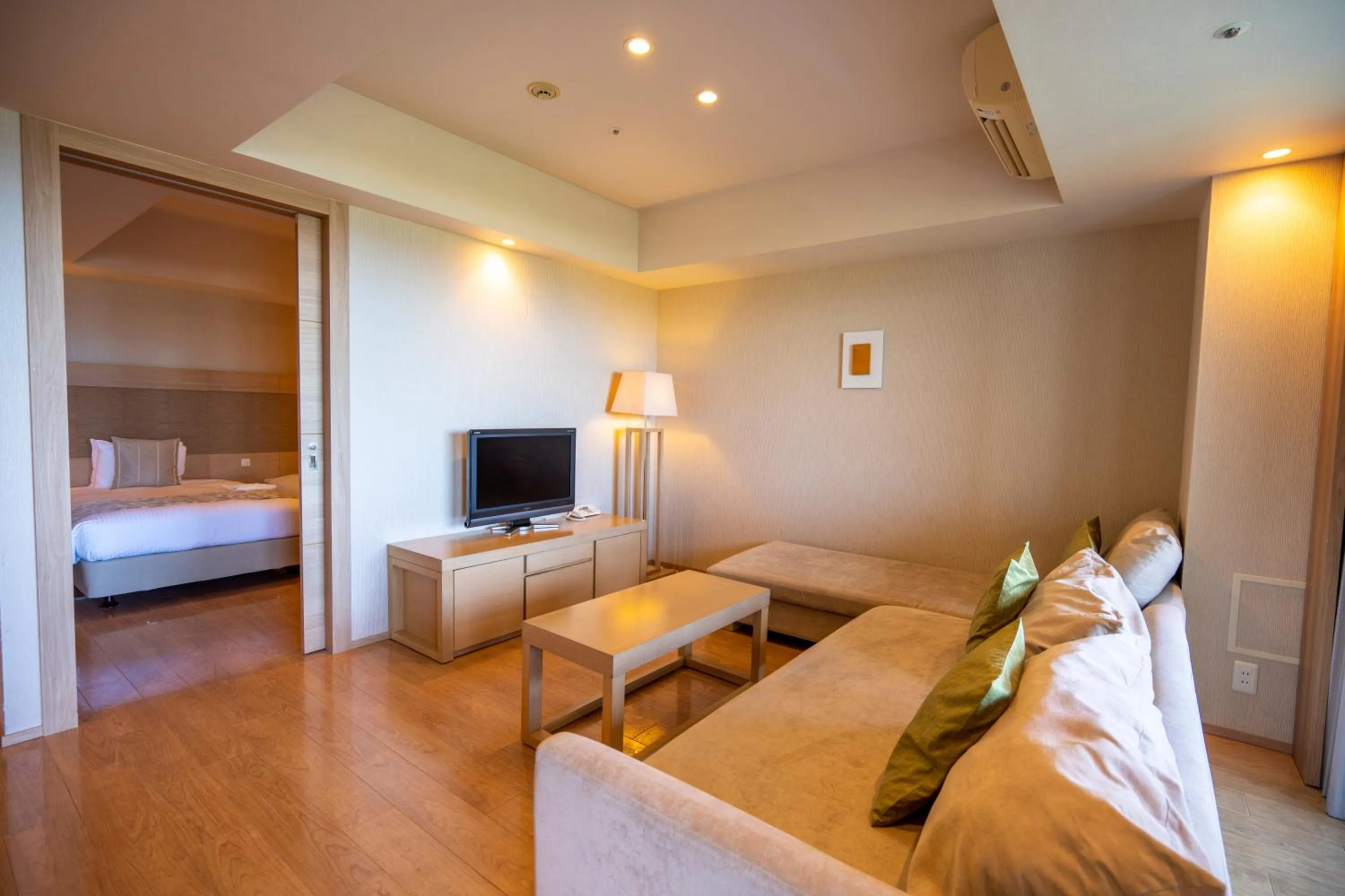 Bed in Moon Ocean Ginowan Hotel & Residence