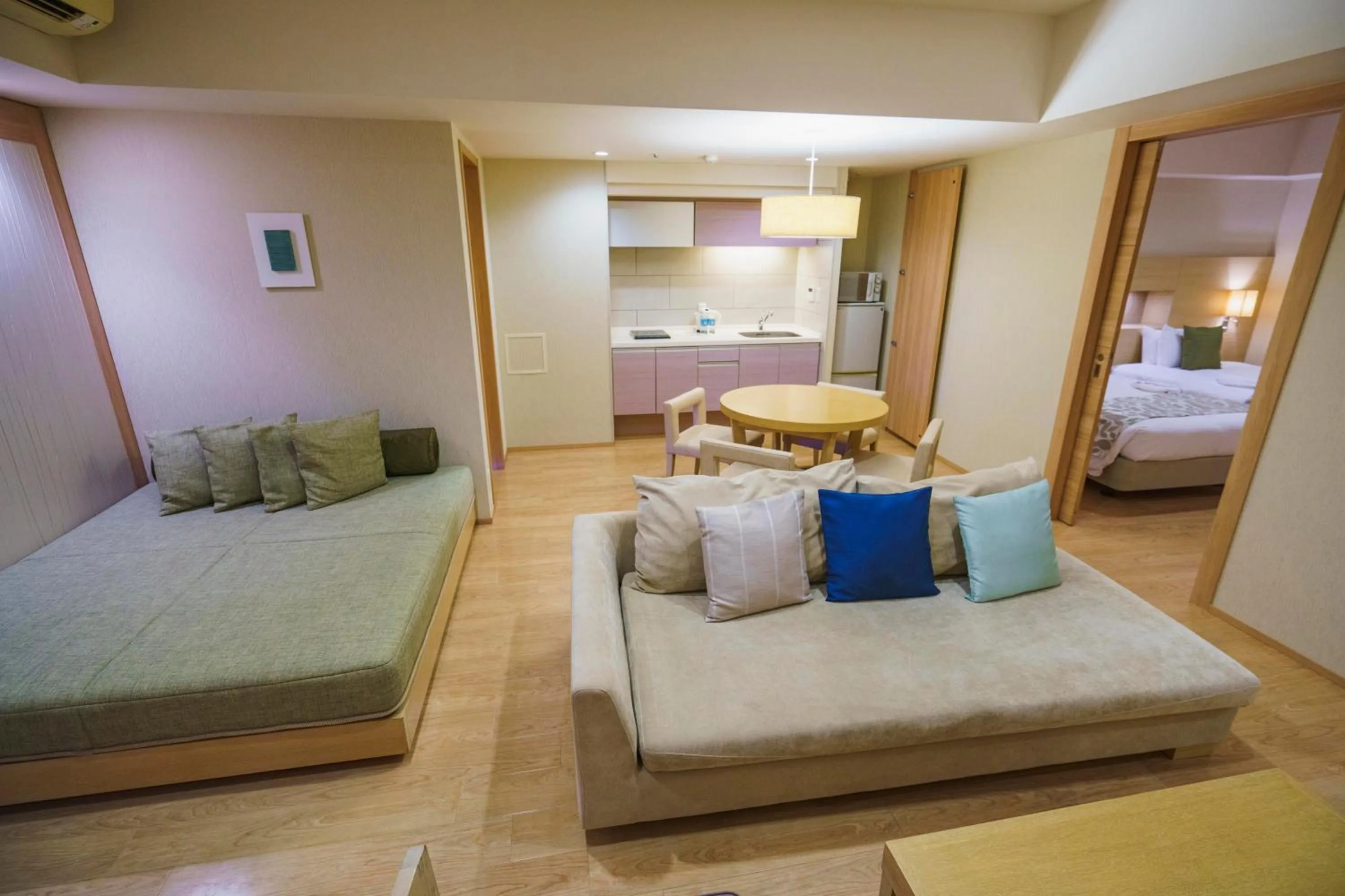 Bed in Moon Ocean Ginowan Hotel & Residence