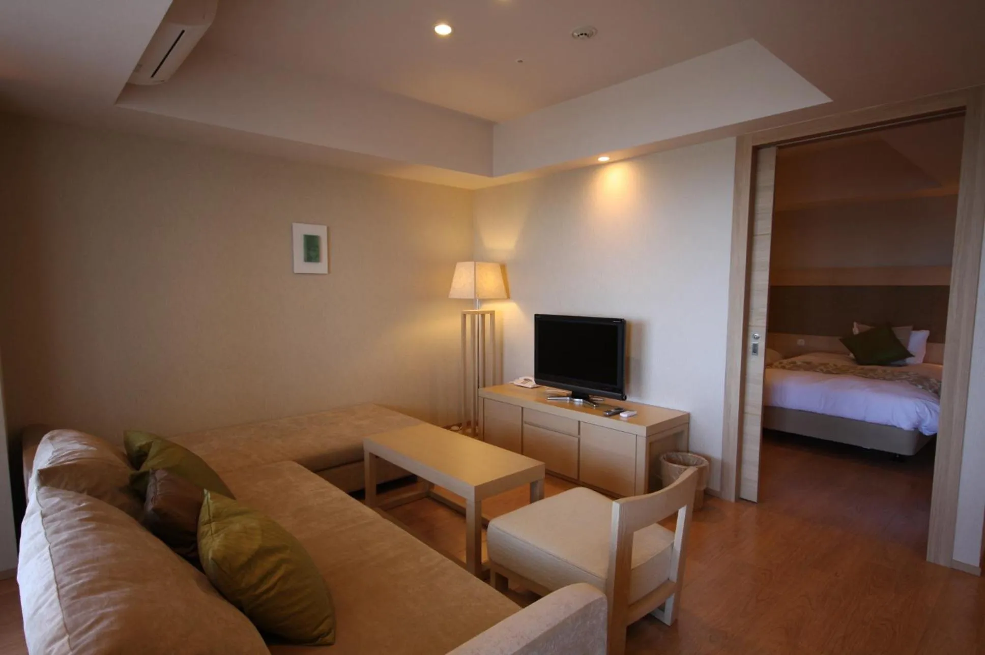 Living room, Bed in Moon Ocean Ginowan Hotel & Residence