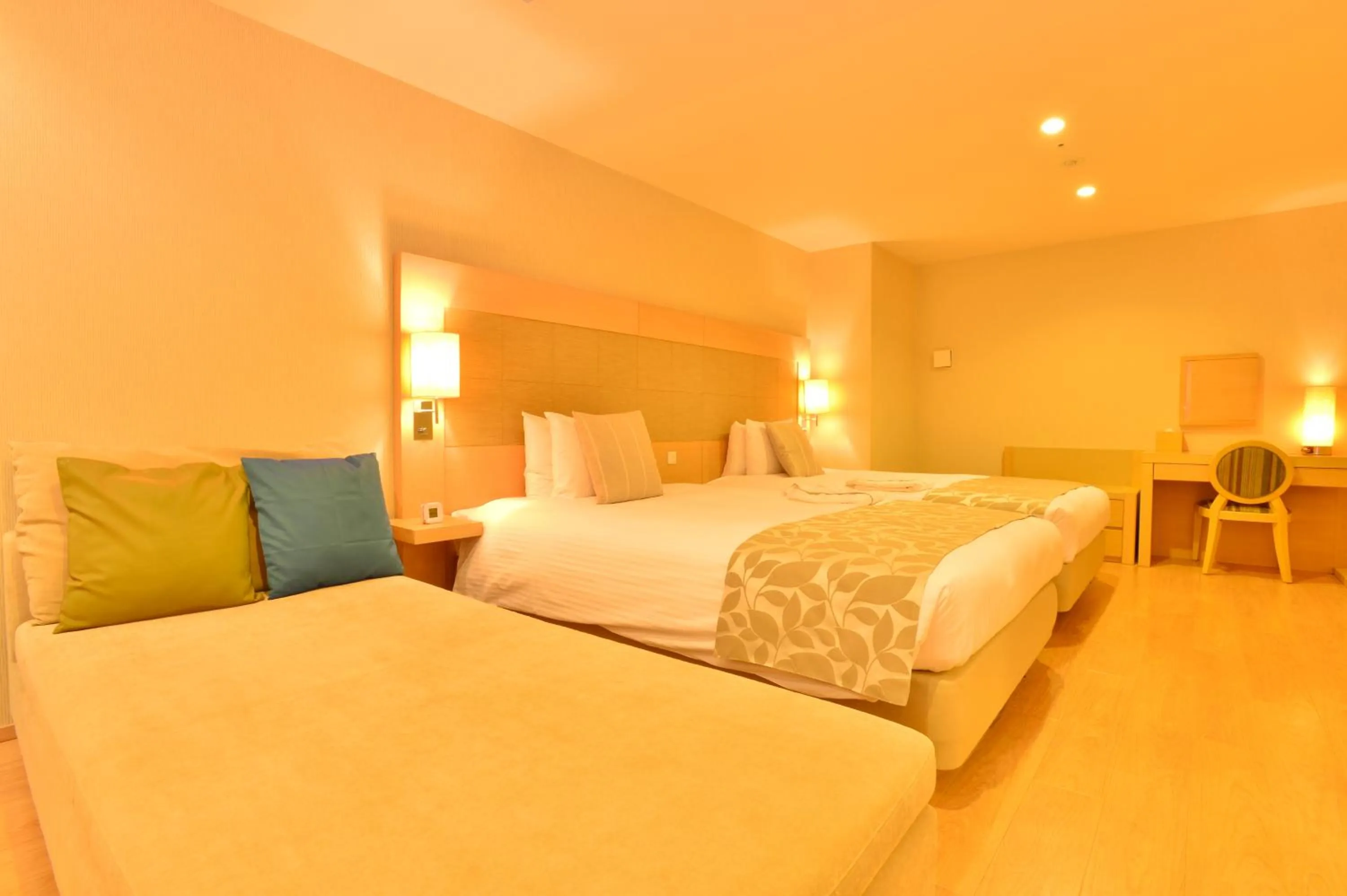 Bed in Moon Ocean Ginowan Hotel & Residence