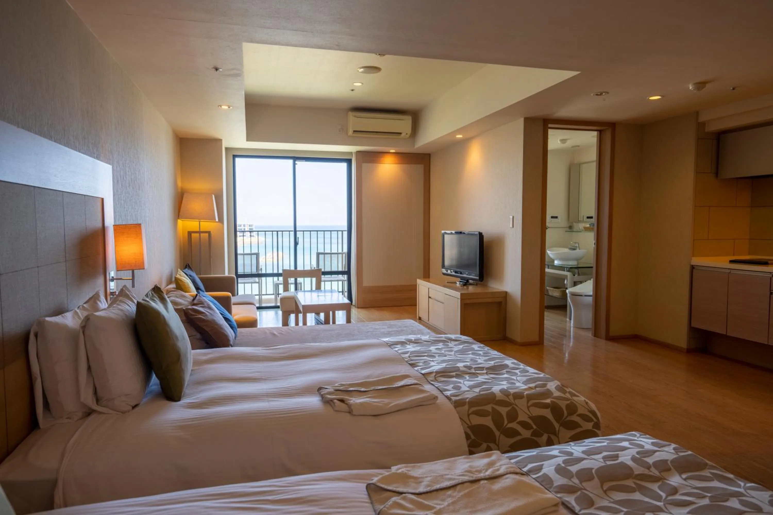 Bed in Moon Ocean Ginowan Hotel & Residence