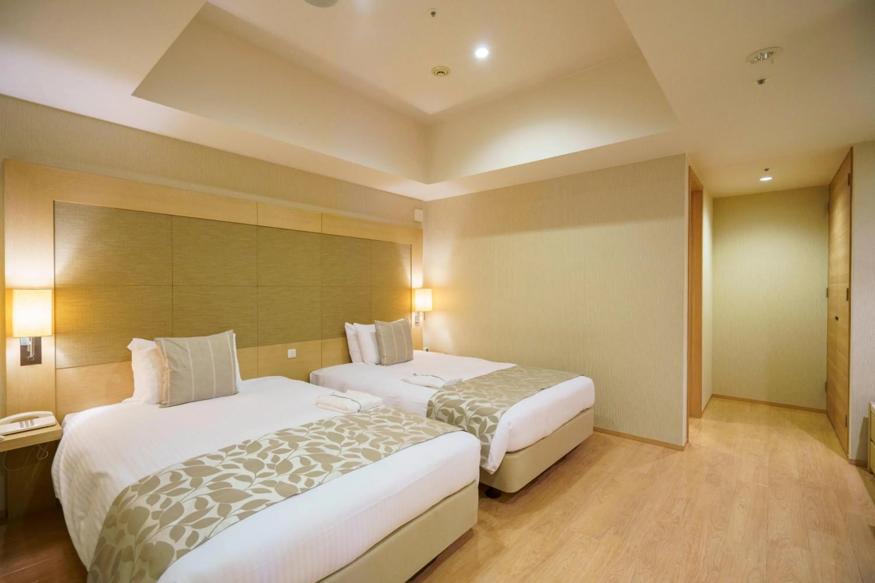 Bed in Moon Ocean Ginowan Hotel & Residence