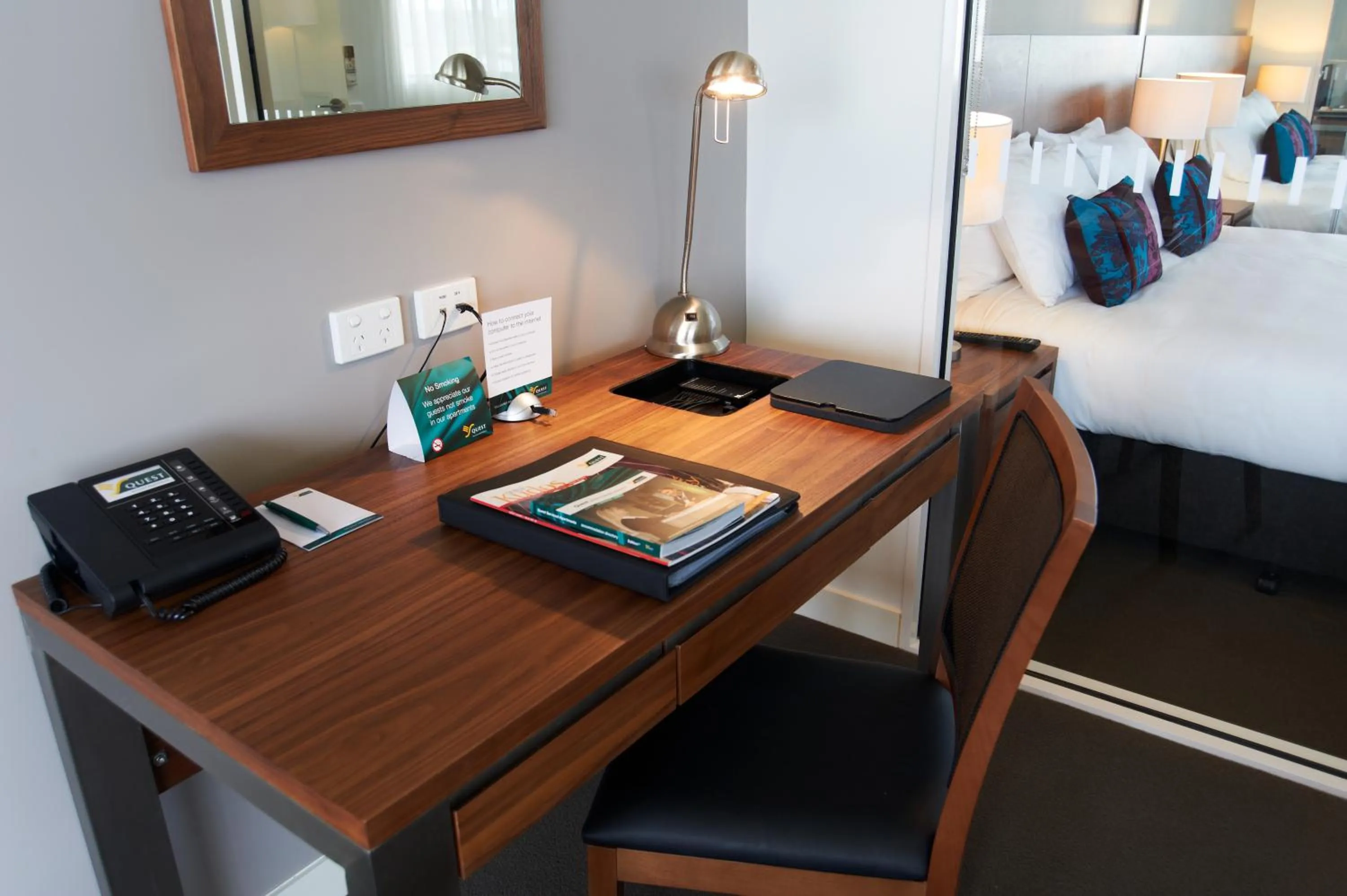 Seating area, Bed in Quest Dubbo
