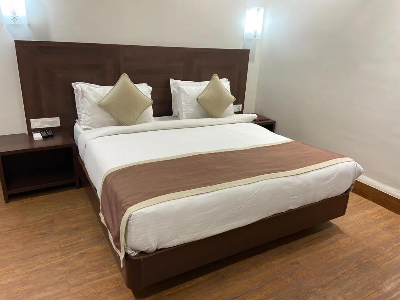 Bed in Chryso Hotels Pvt Ltd