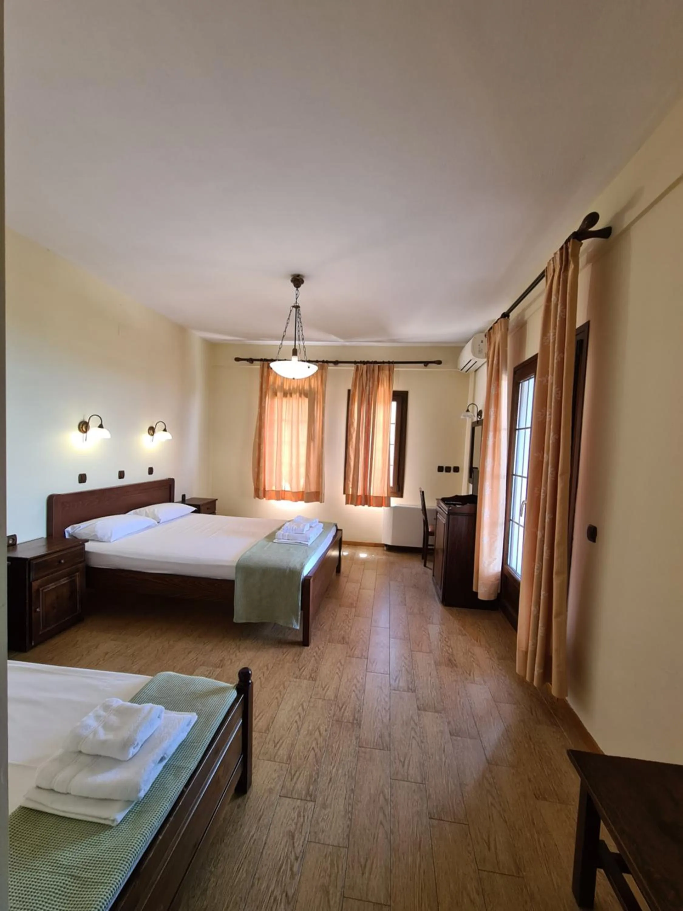 Bed in Agnanti Hotel