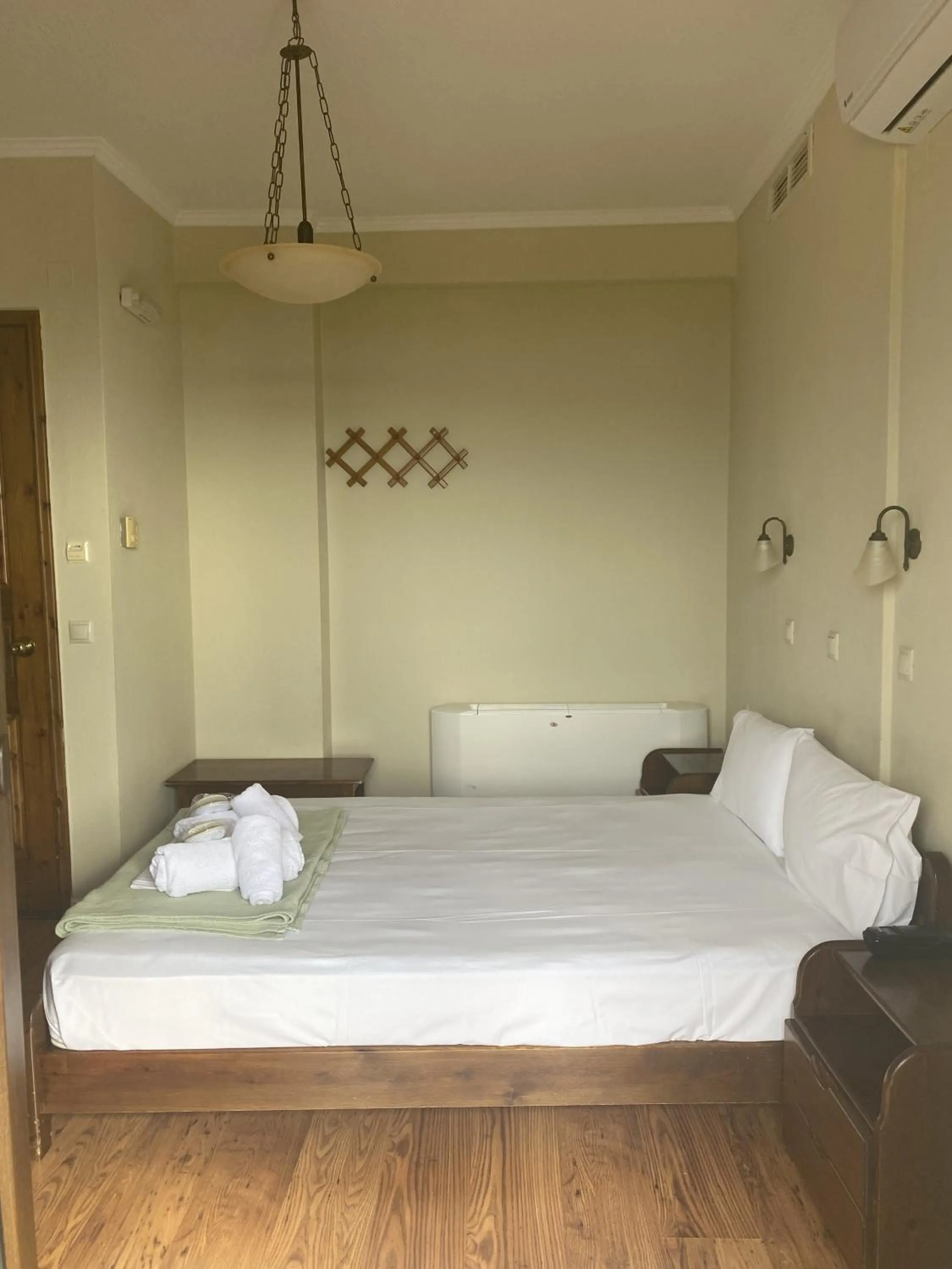 Bed in Agnanti Hotel