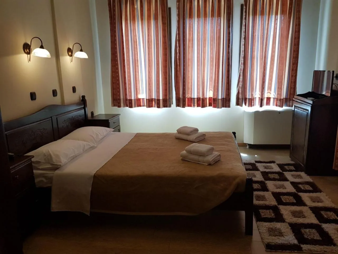 Bed in Agnanti Hotel