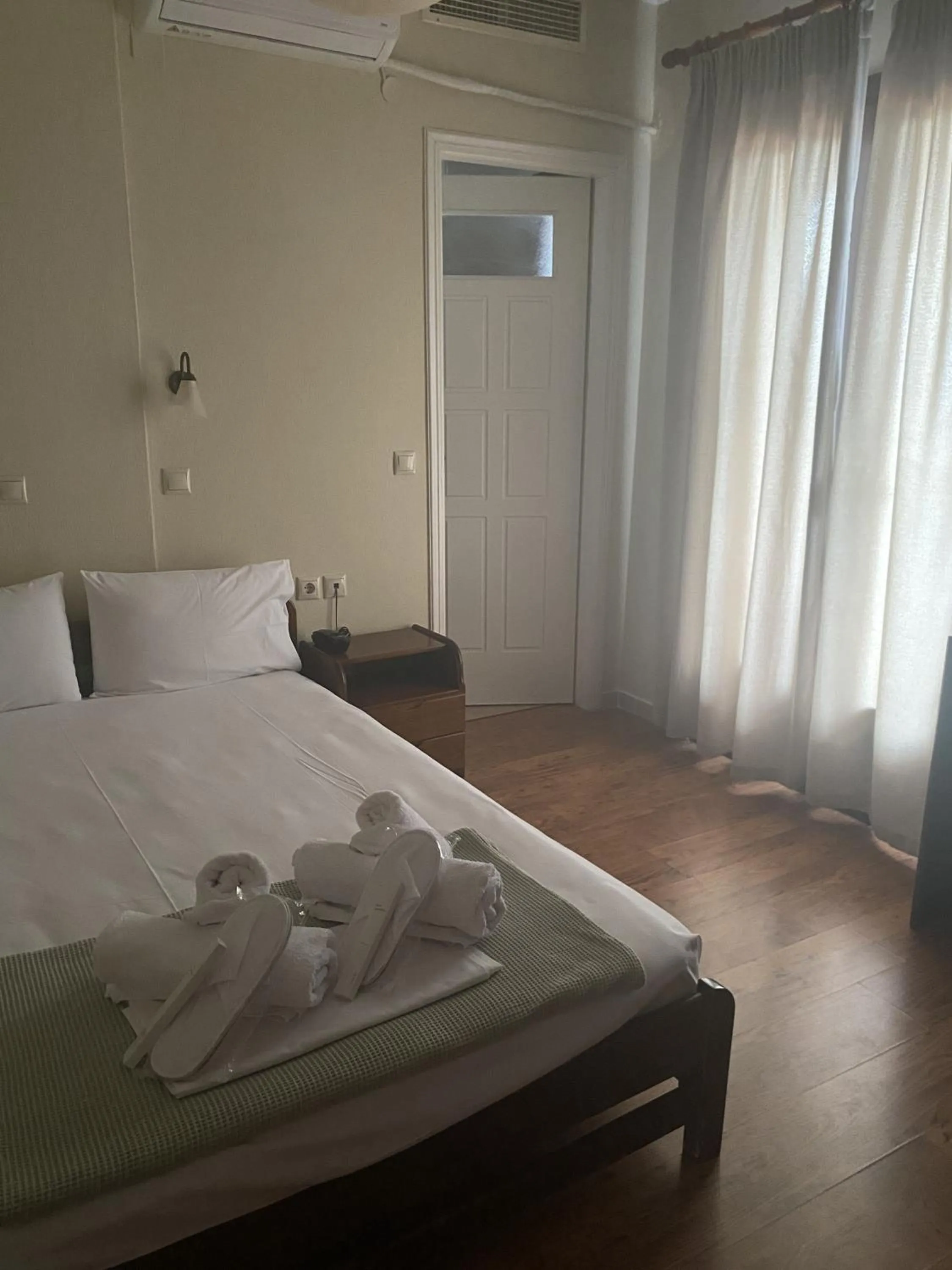 Bed in Agnanti Hotel