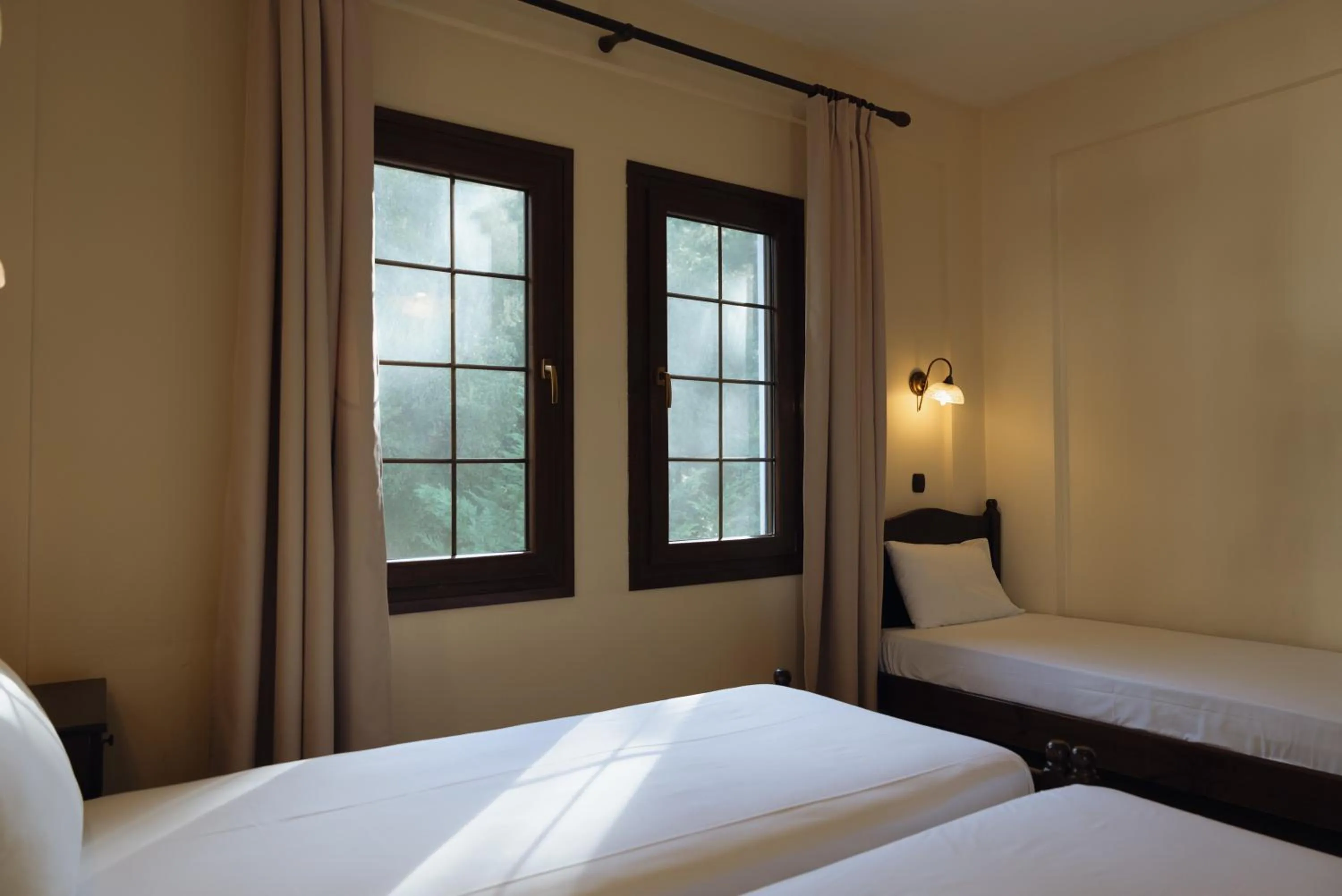 Bed in Agnanti Hotel