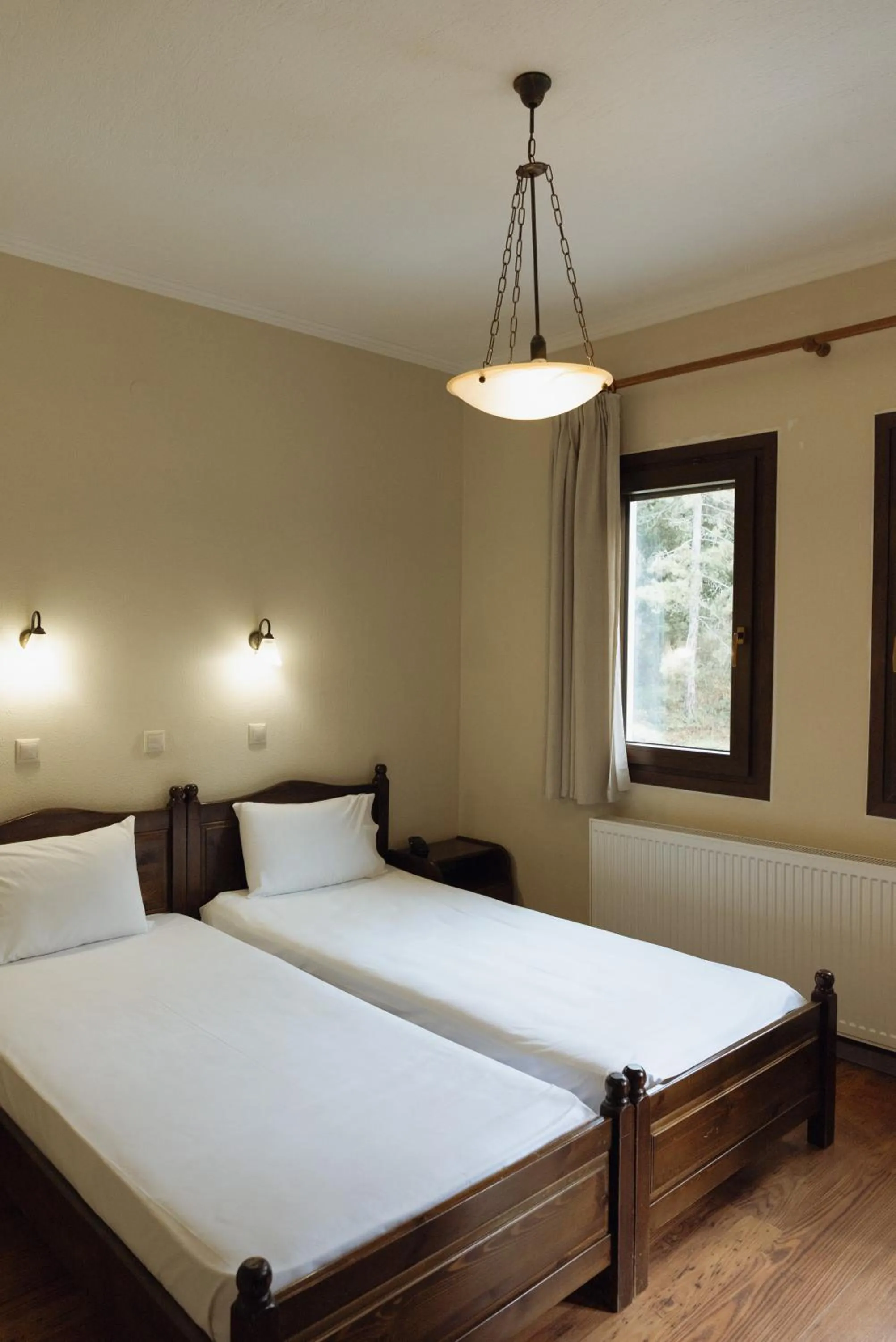 Bed in Agnanti Hotel