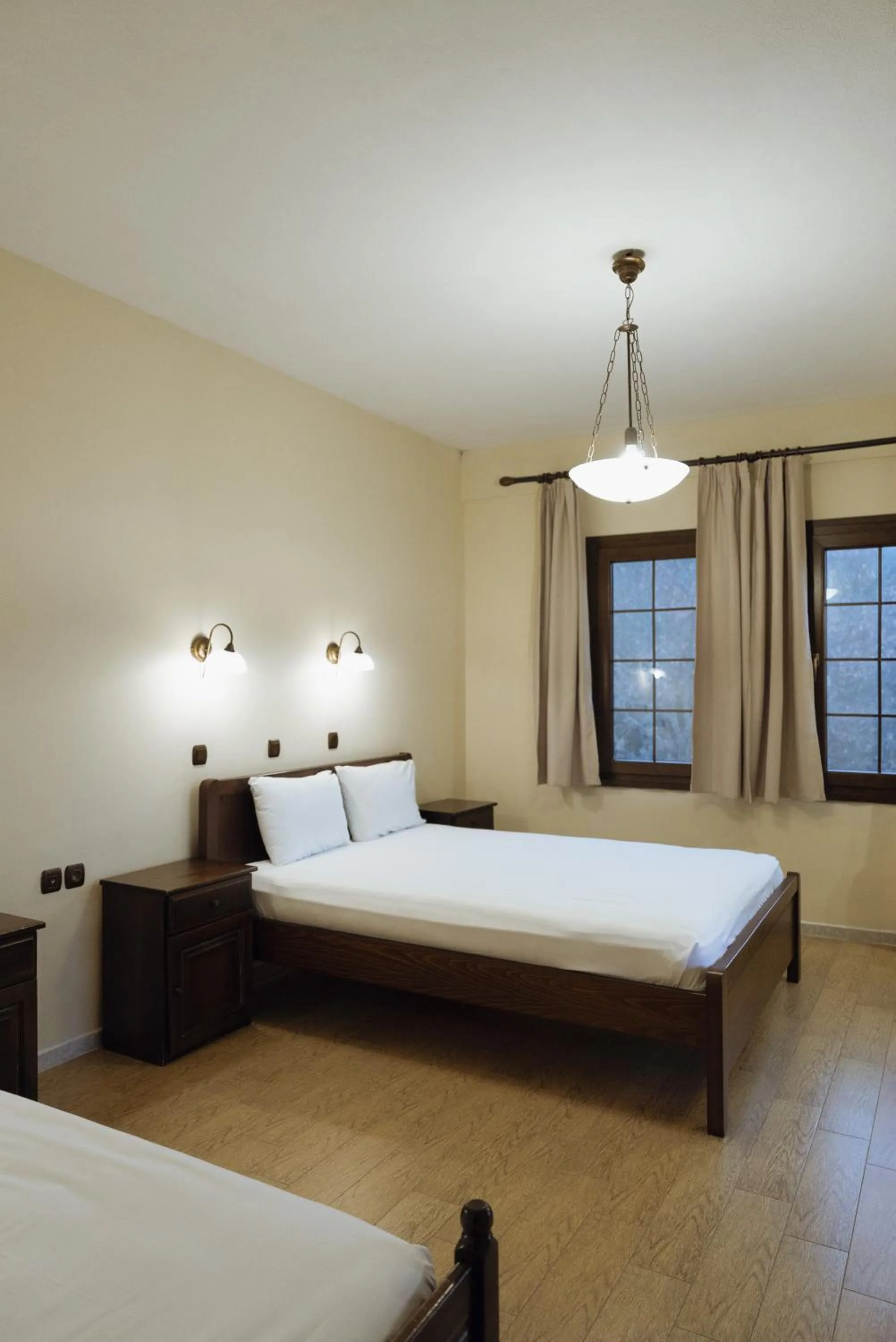 Bed in Agnanti Hotel