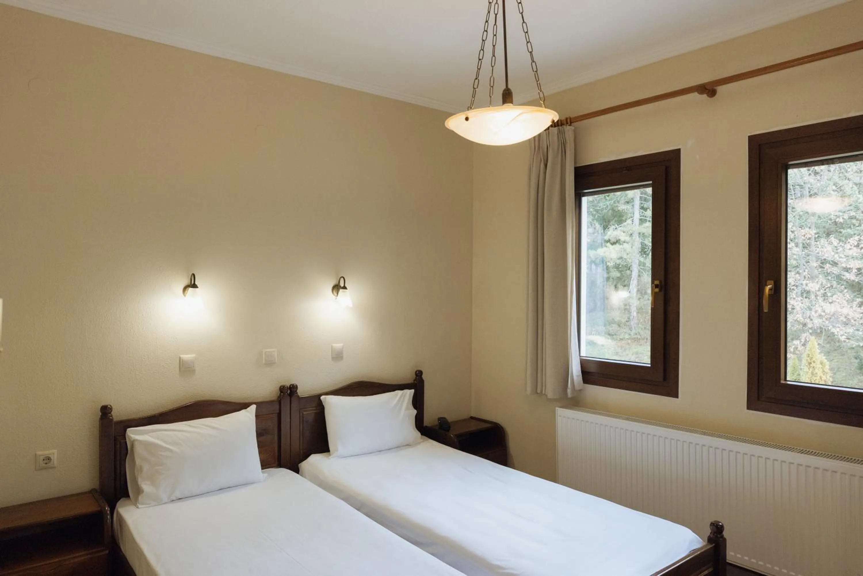 Bed in Agnanti Hotel