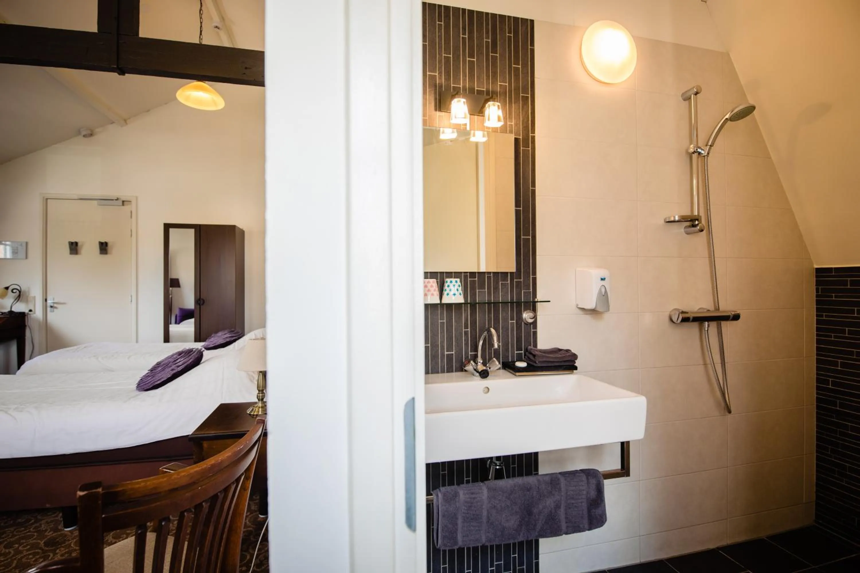 Bed in Hotel de Reiziger