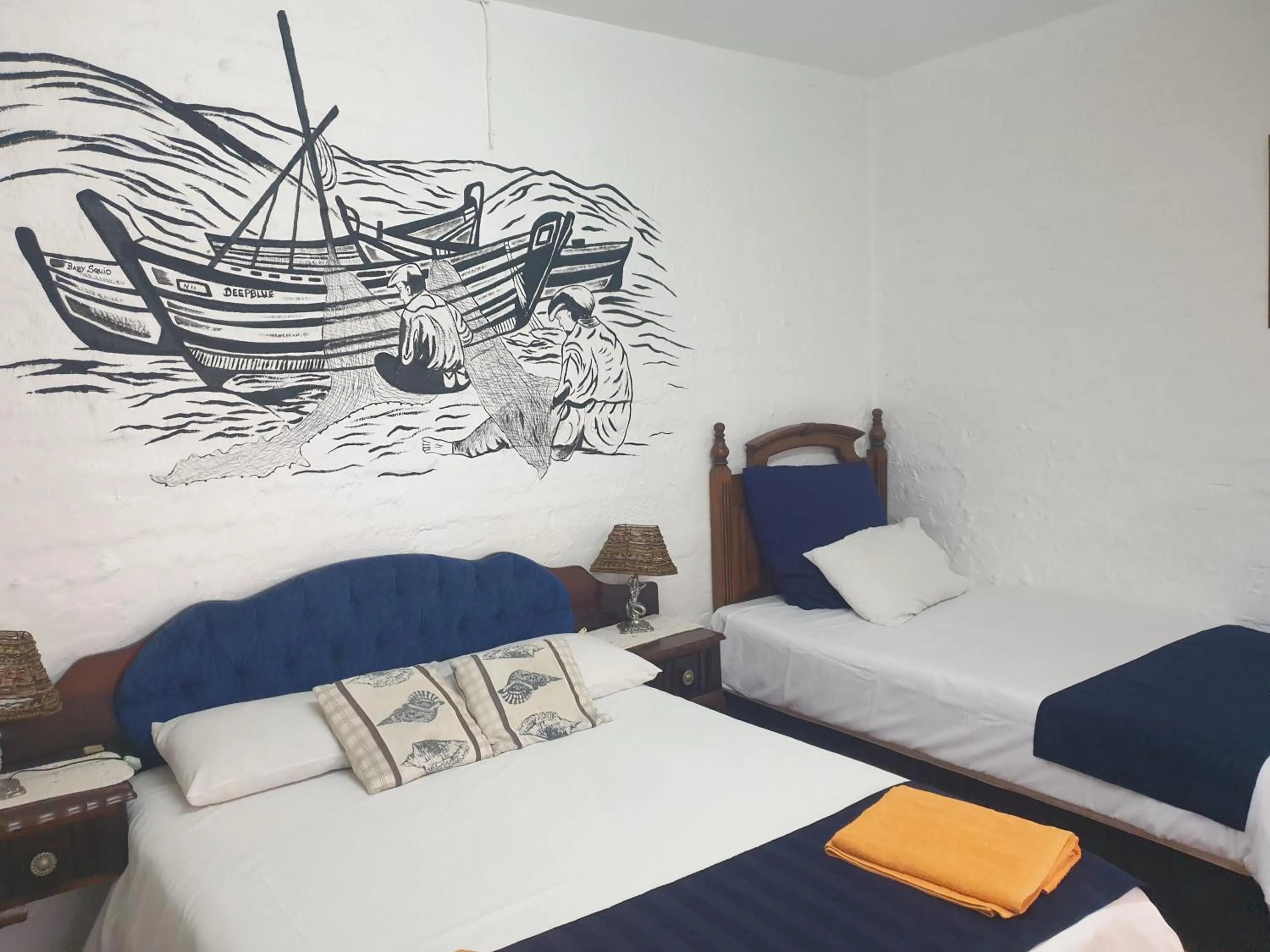 Photo of the whole room, Bed in Deep Blue Guest House