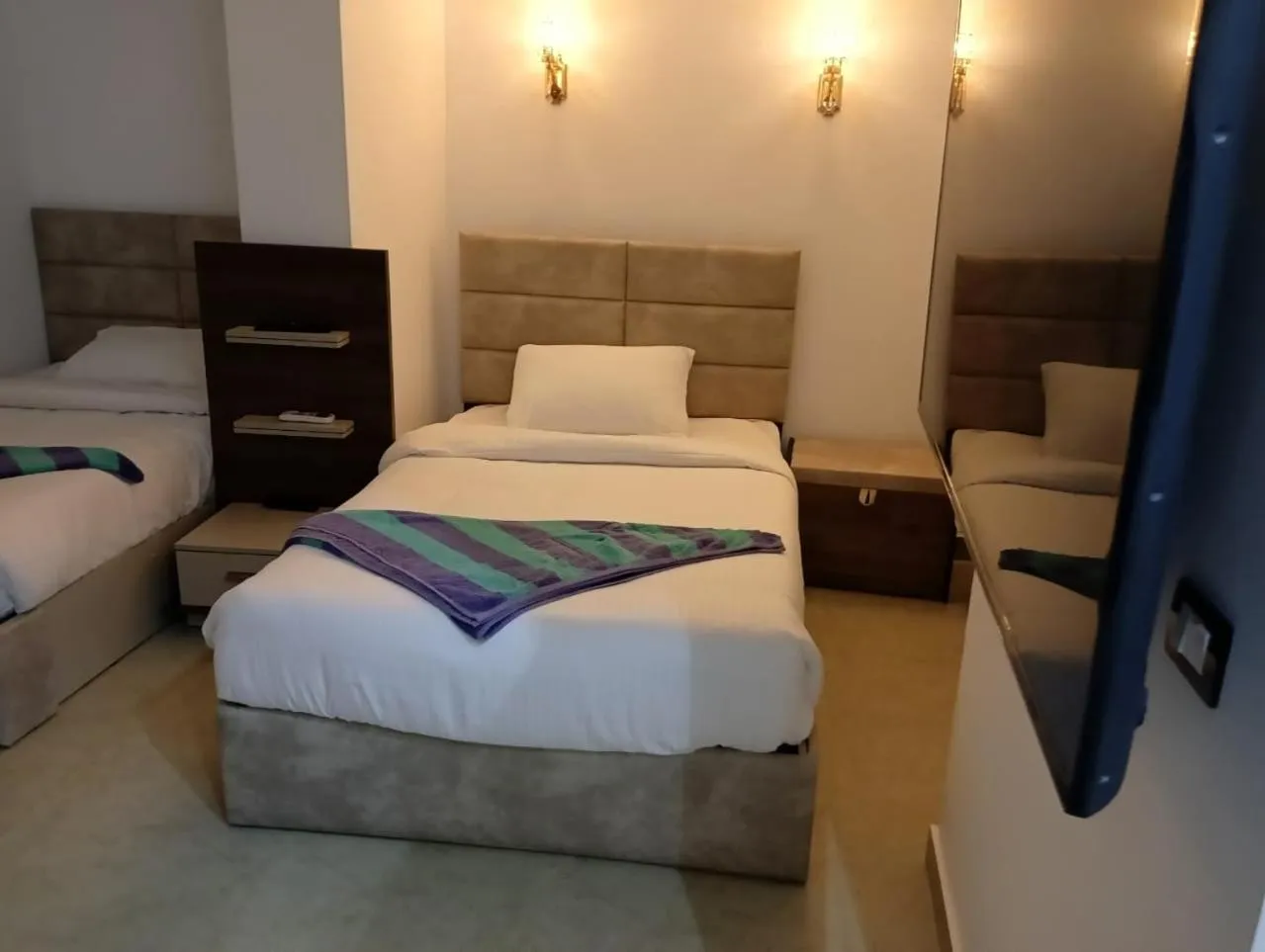 Bed in Porto Marina Apartments powered By Amer-Group