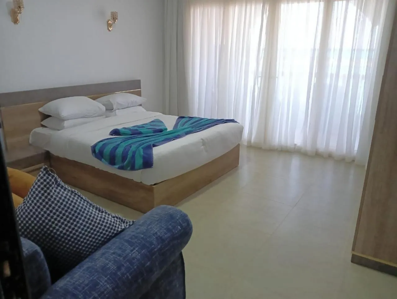 Bed in Porto Marina Apartments powered By Amer-Group