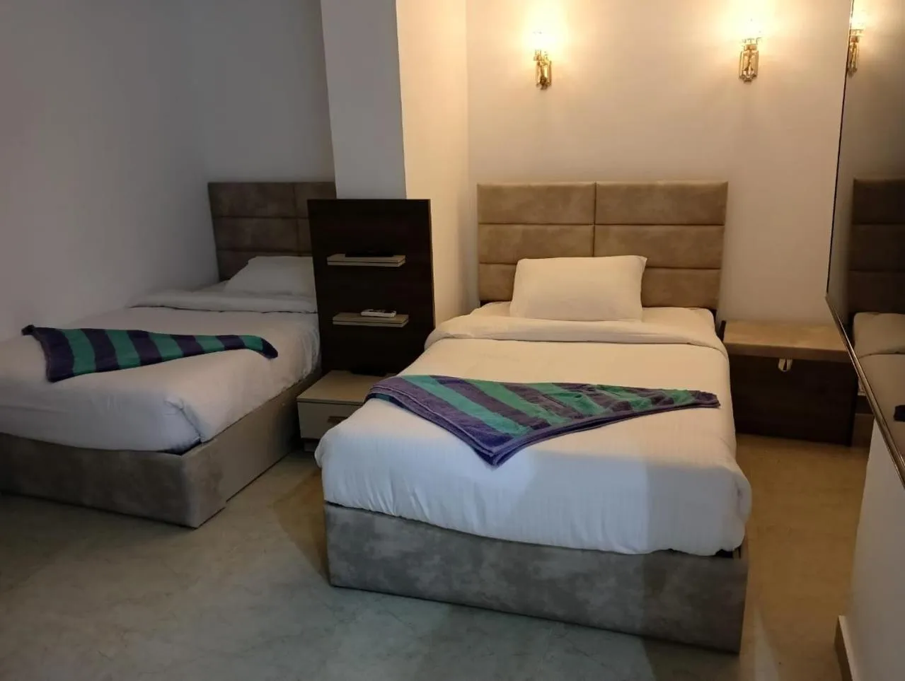 Bed in Porto Marina Apartments powered By Amer-Group