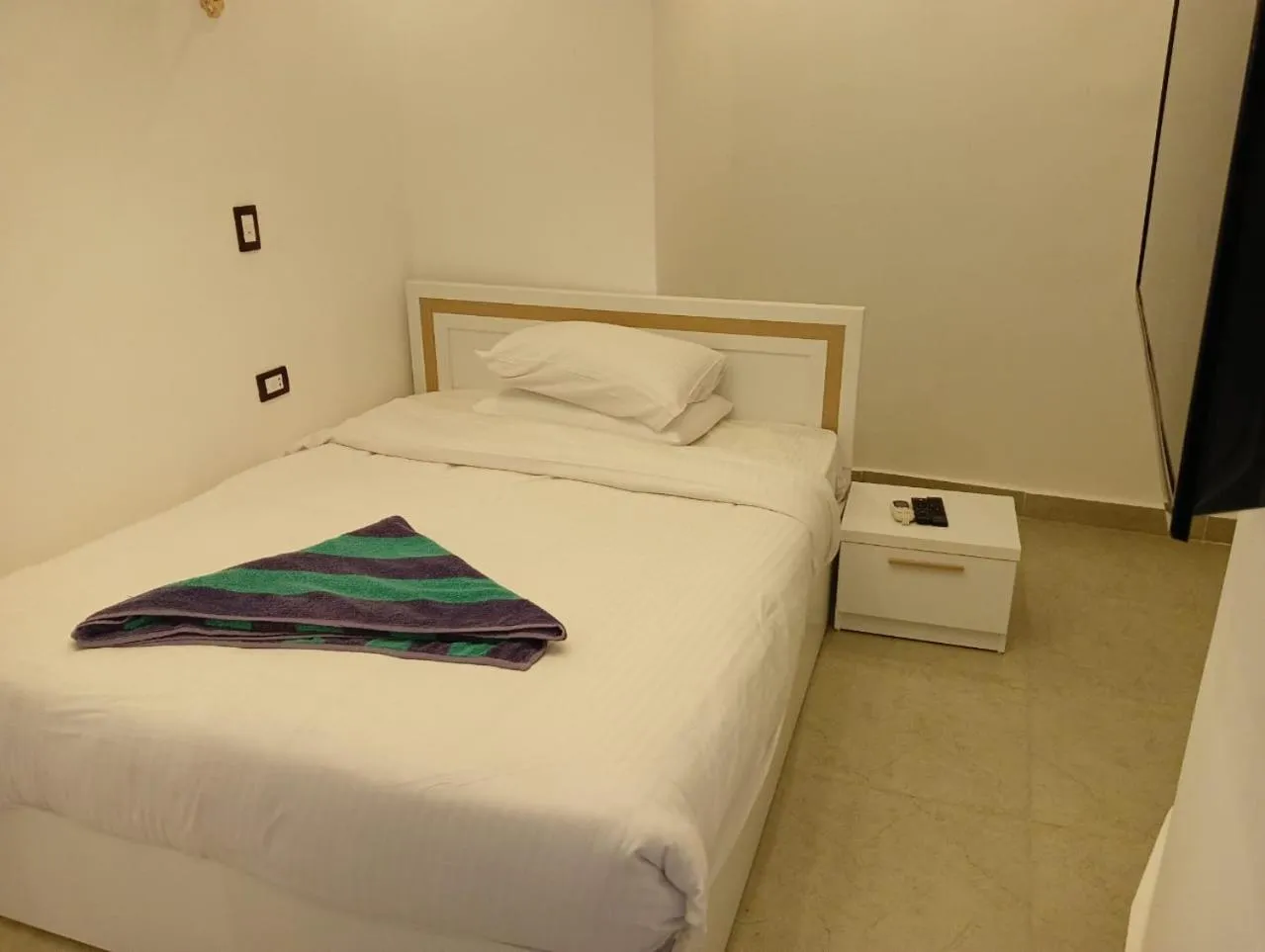 Bed in Porto Marina Apartments powered By Amer-Group