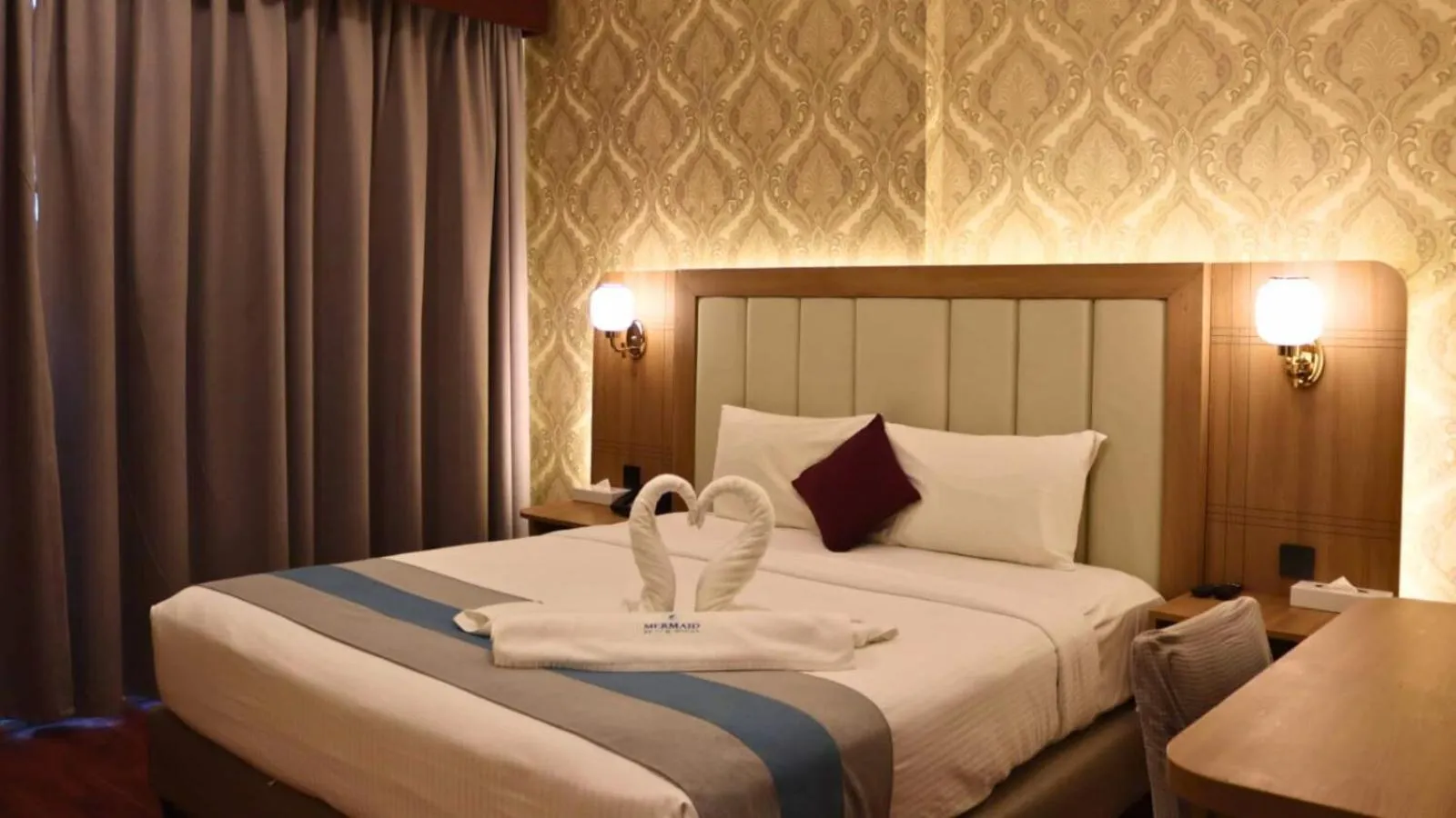 Bed in Mermaid Beach Hotel LLC