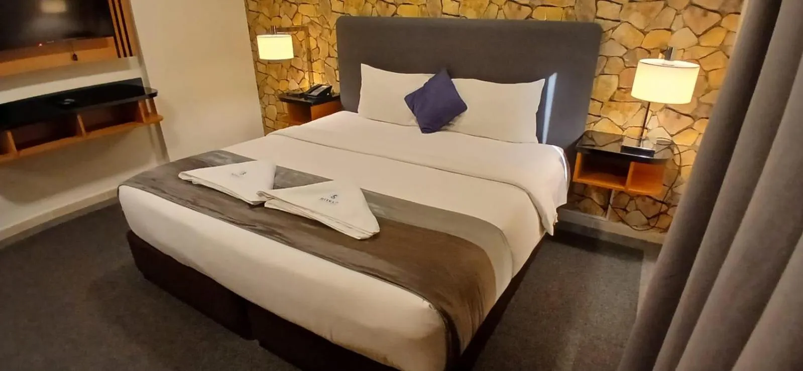 Bed in Mermaid Beach Hotel LLC