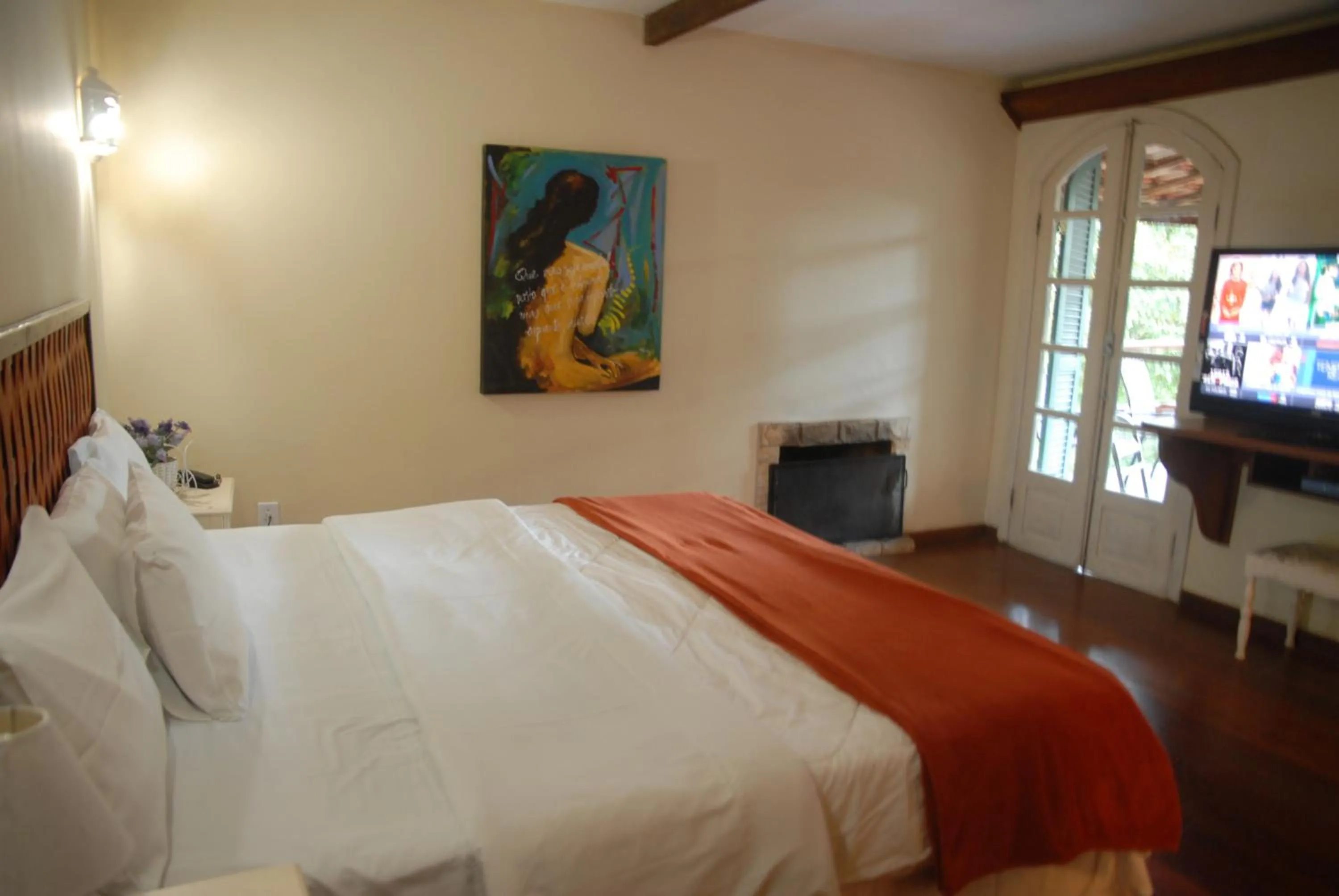 Bed in Pousada Mirante do Penedo