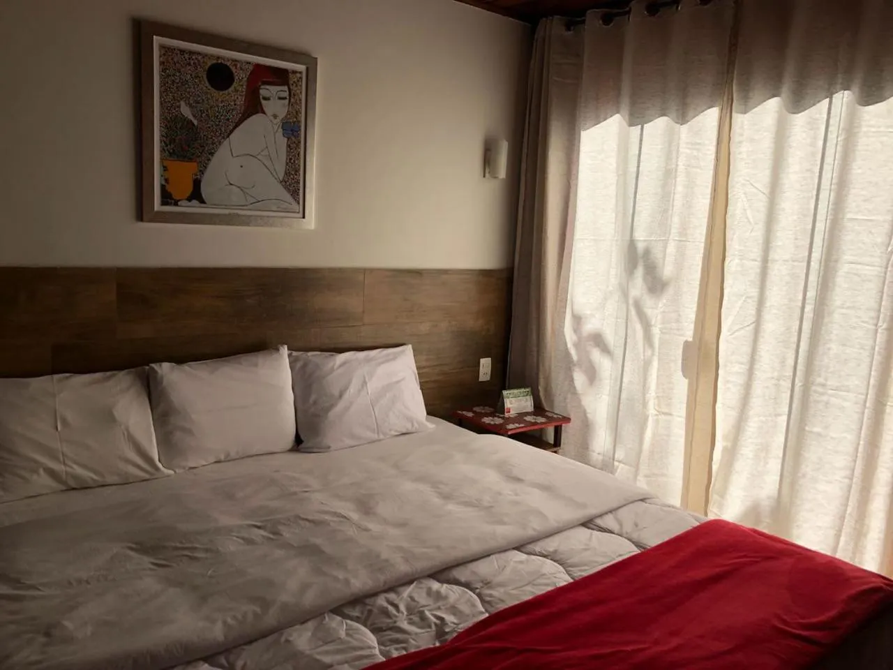 Bed in Pousada Mirante do Penedo