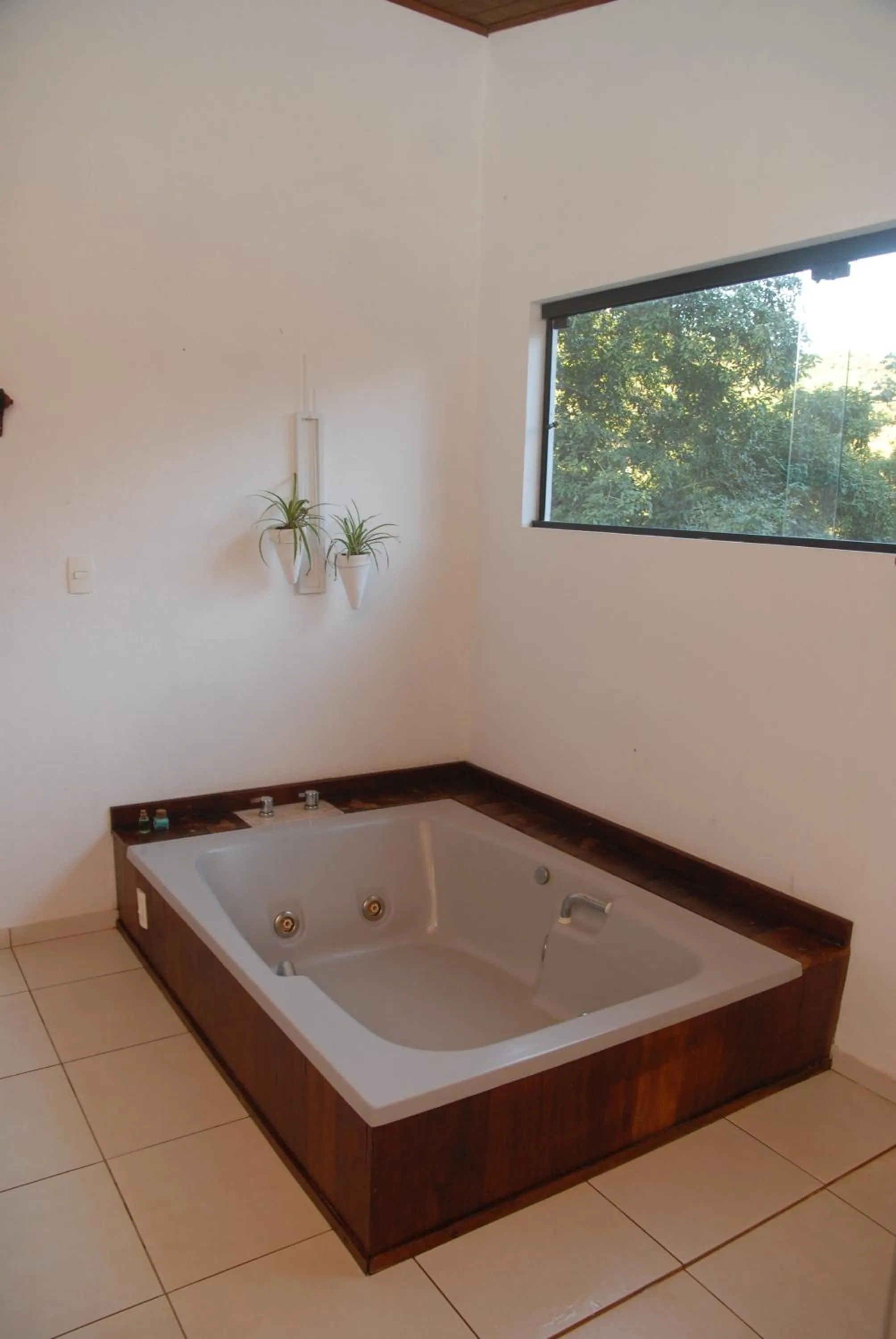 Hot Tub in Pousada Mirante do Penedo