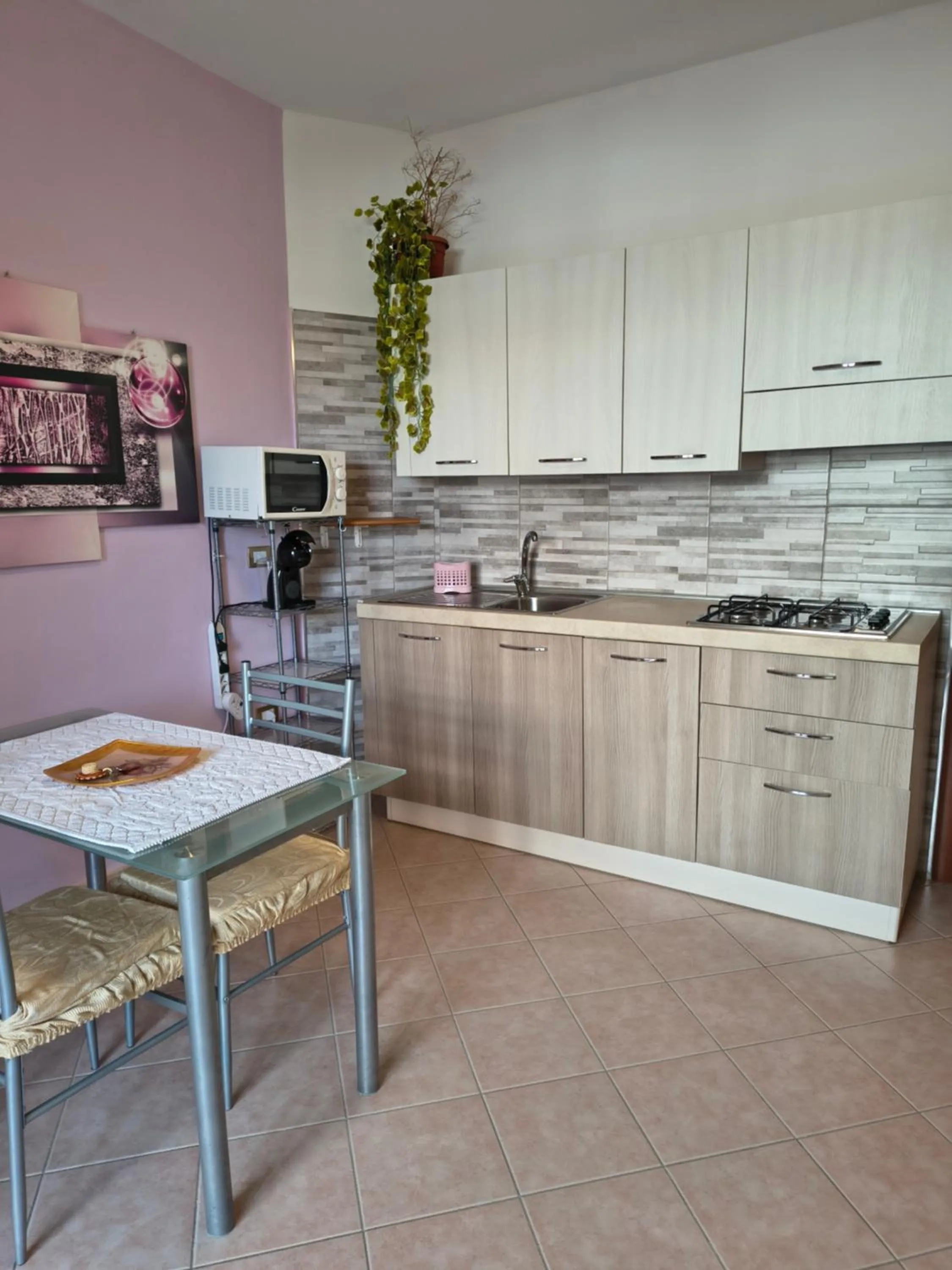 Kitchen or kitchenette in La Fortezza casa vacanze & appartament