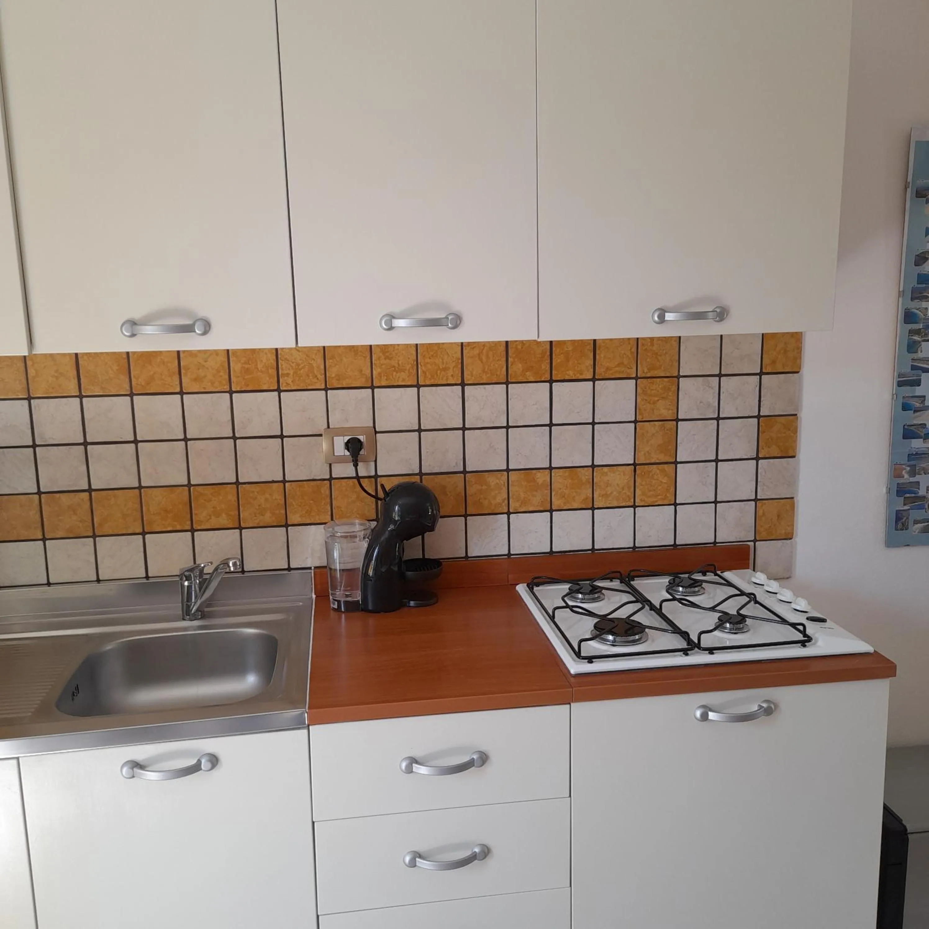 Kitchen or kitchenette in La Fortezza casa vacanze & appartament