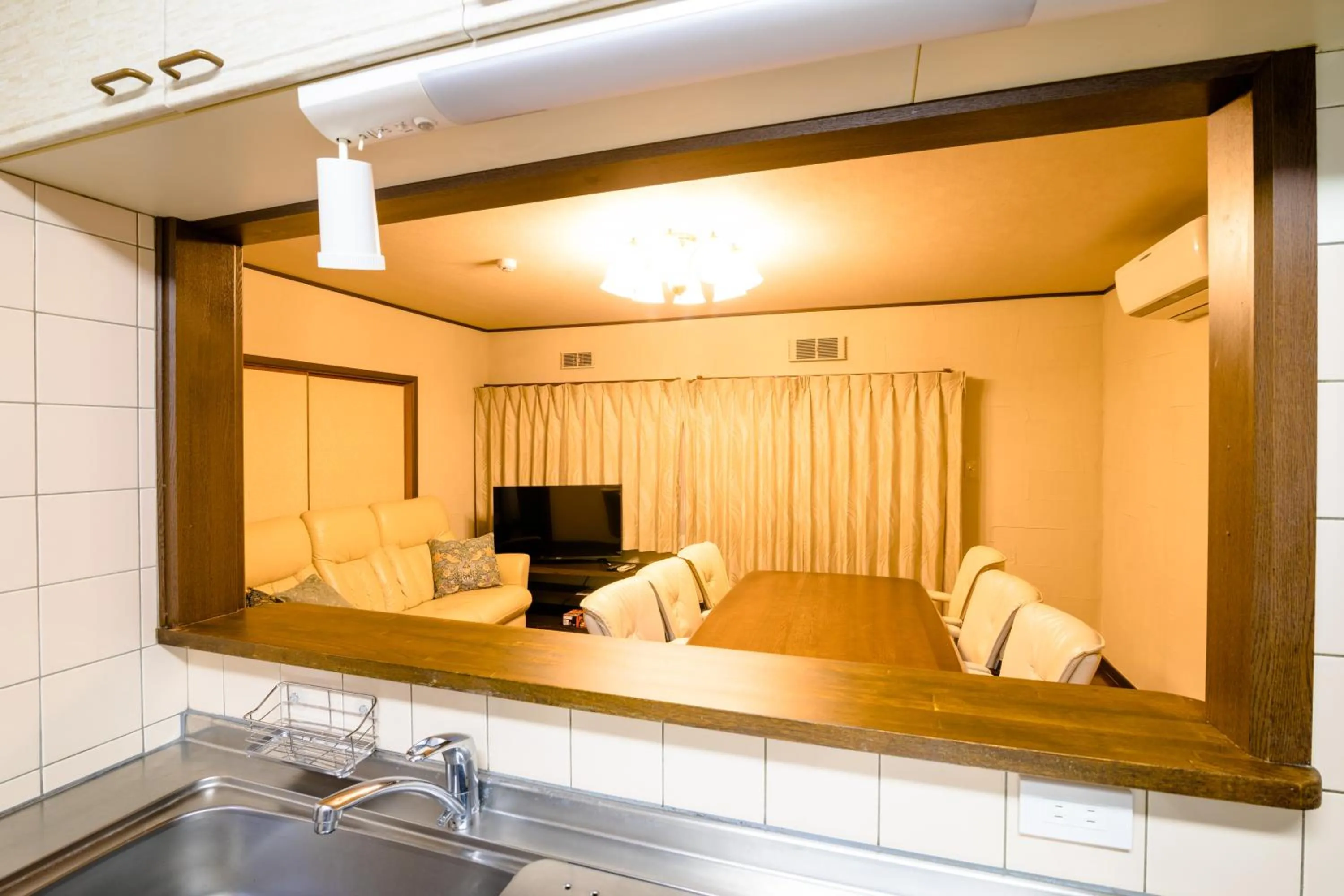 Kitchen or kitchenette in villa yawaragi