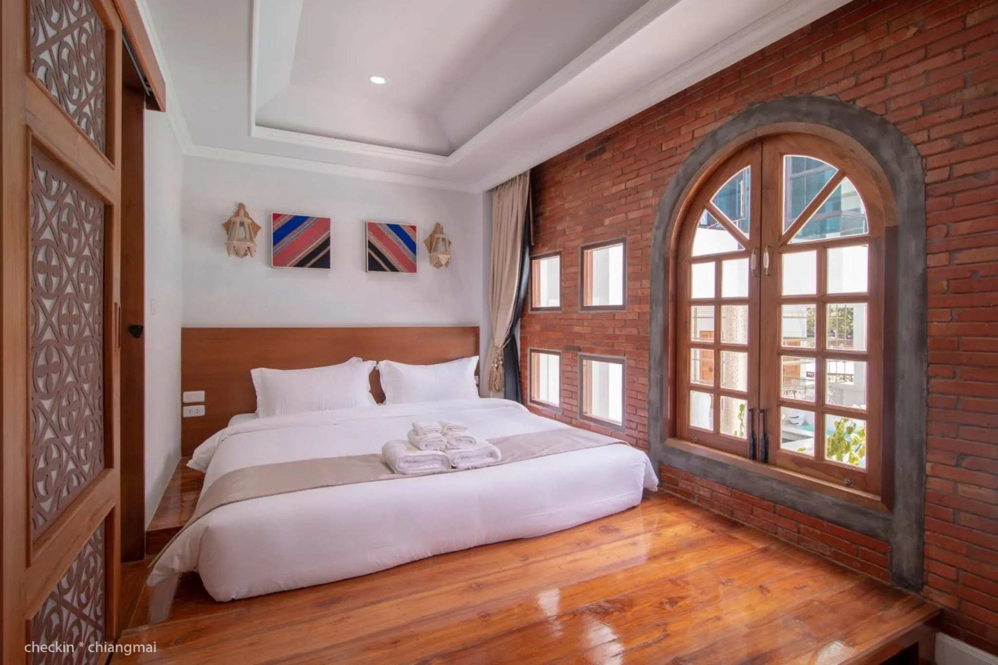 Bed in Lanna Oriental Hotel