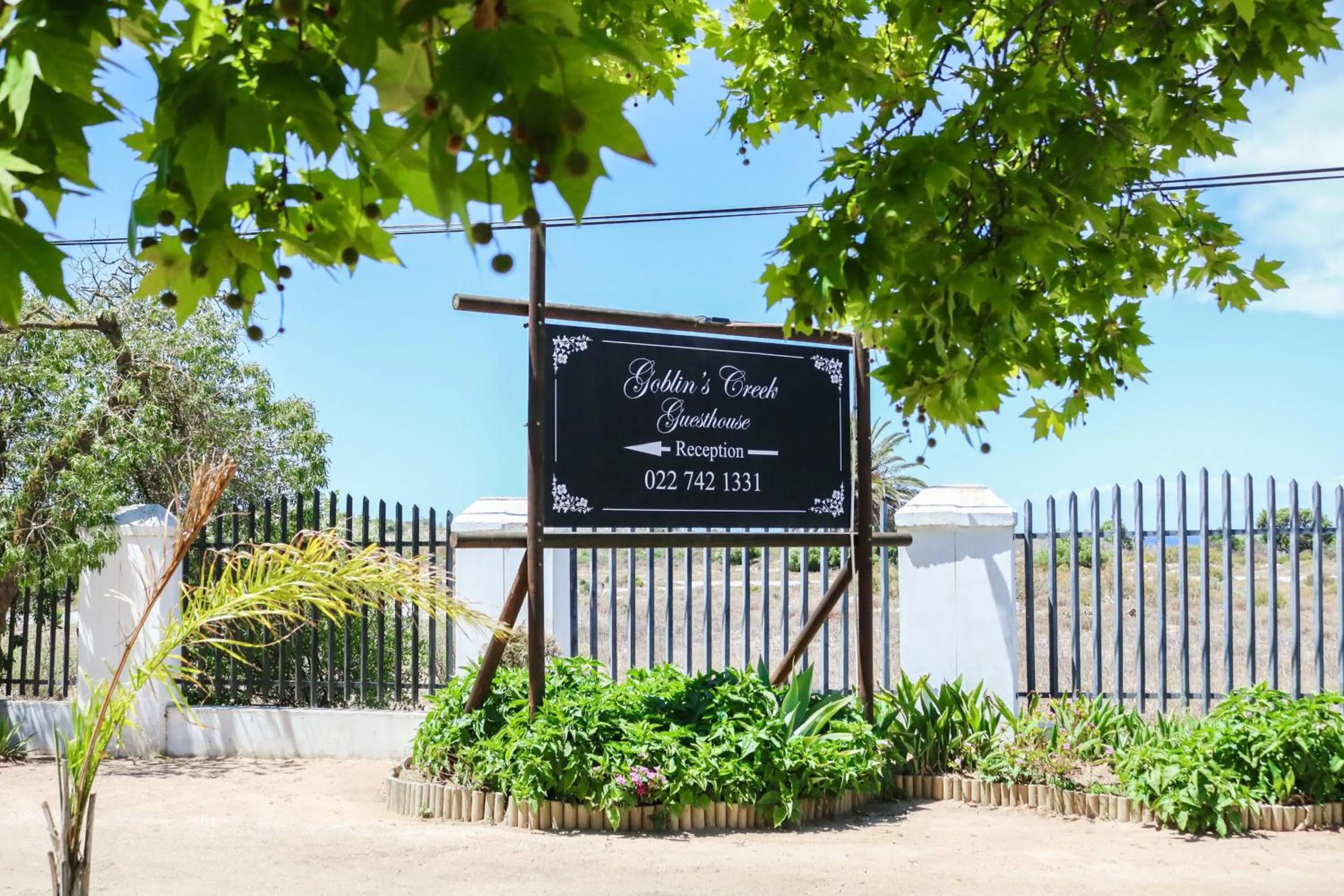 Property logo or sign in Goblin's Creek