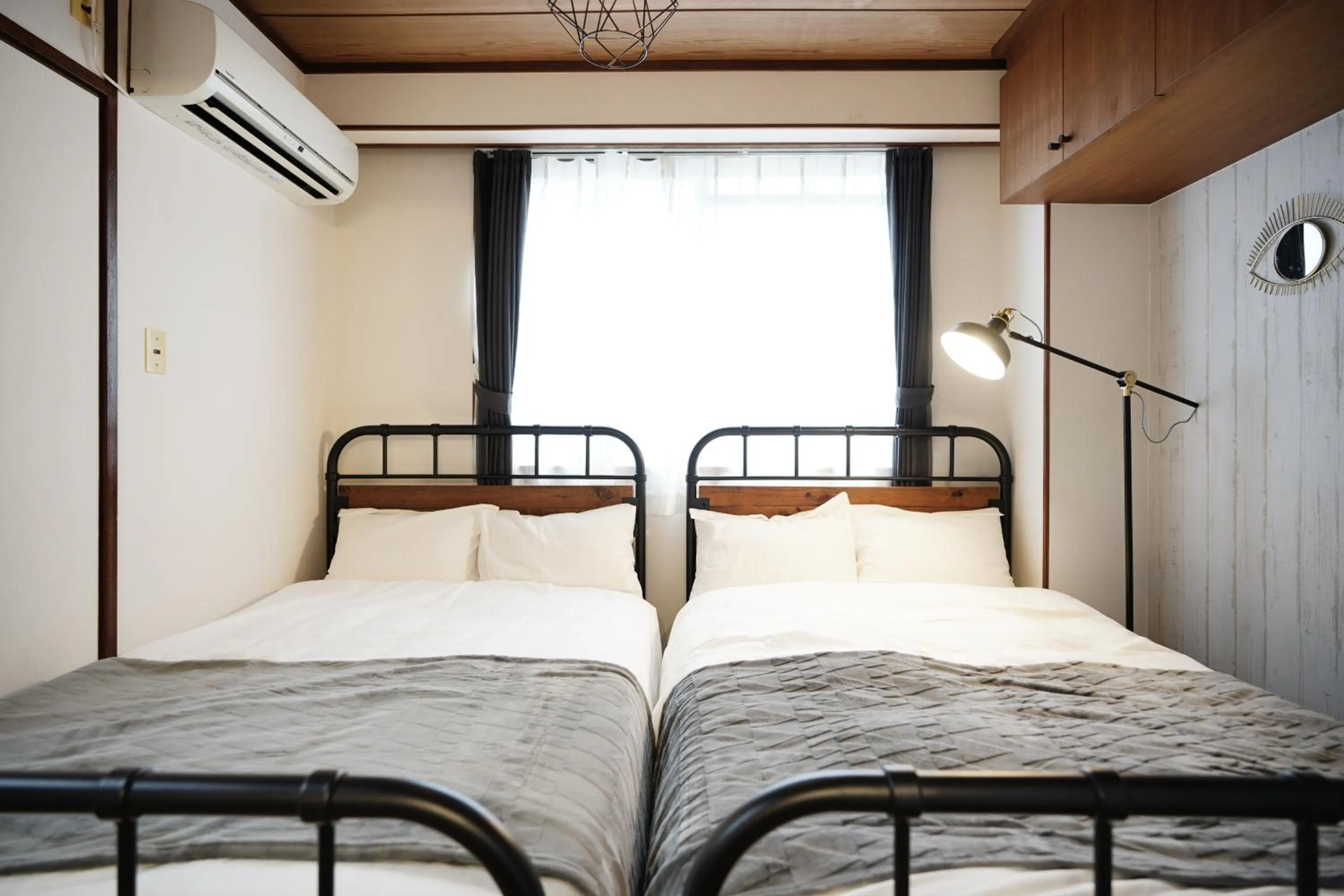 Bedroom, Bed in Naha Southerlies Condominium Kumoji