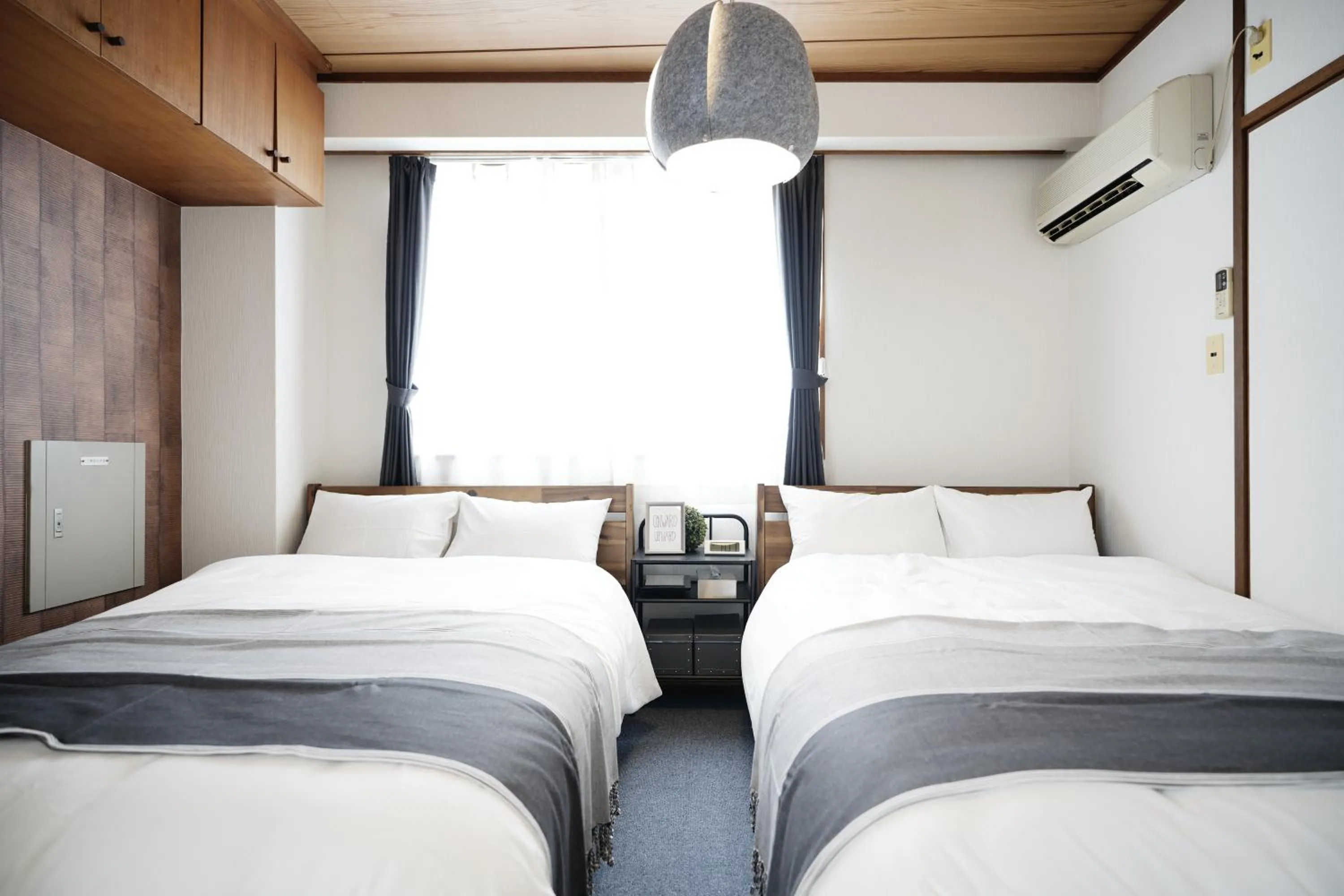 Bedroom, Bed in Naha Southerlies Condominium Kumoji