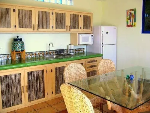 Kitchen or kitchenette in Los Colibris Casitas